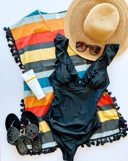 Beach essentials. Amazon fashion swimsuit and coverup. Amazon sunglasses. J Crew straw hat. Jack Rogers jelly sandals. Beautycounter sunscreen.

#liketkit @shop.ltk https://liketk.it/41SYb

Vacation essentials, vacation outfit ideas, swim coverup, beach coverup, island outfit, vacation outfits, striped swim cover up, spring break, spring outfits 2023, summer outfits 2023, black one piece swimsuit 

#LTKswim #LTKU #LTKtravel