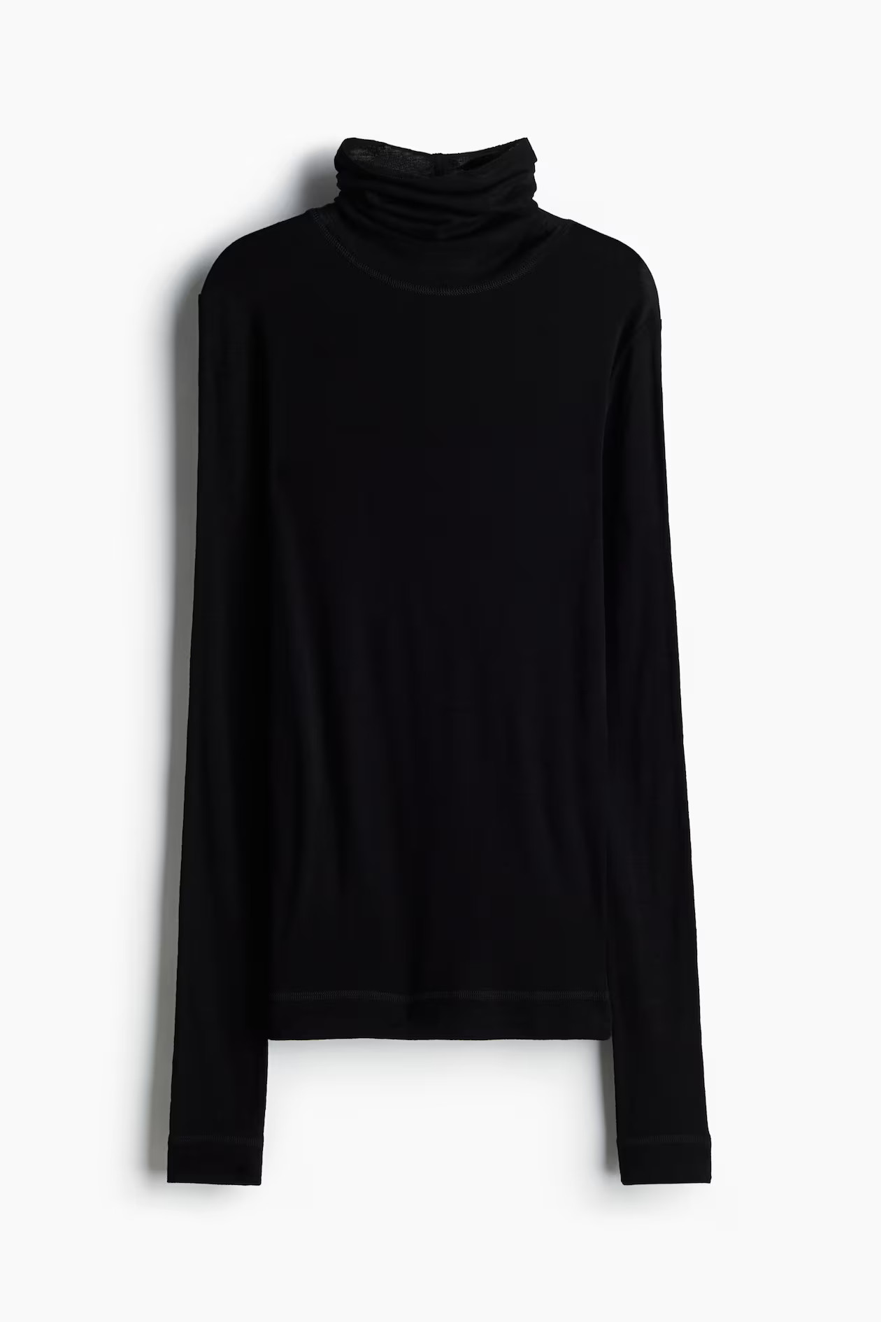 Top de lana con cuello alto - Crema - MUJER | H&M ES | H&M (FR, IT, ES, PT, BE)