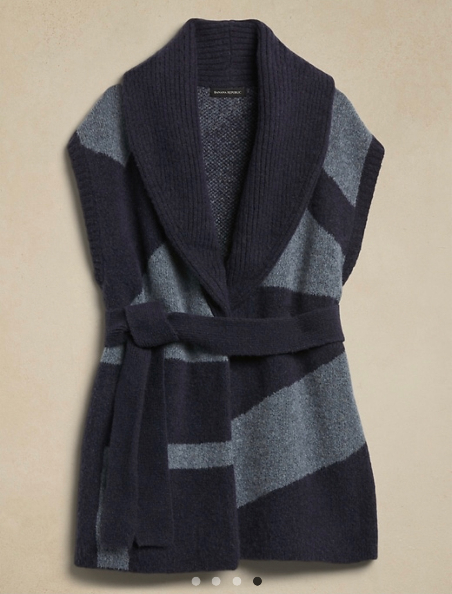 Sleeveless blue cardigan 

#LTKSeasonal #LTKworkwear #LTKstyletip