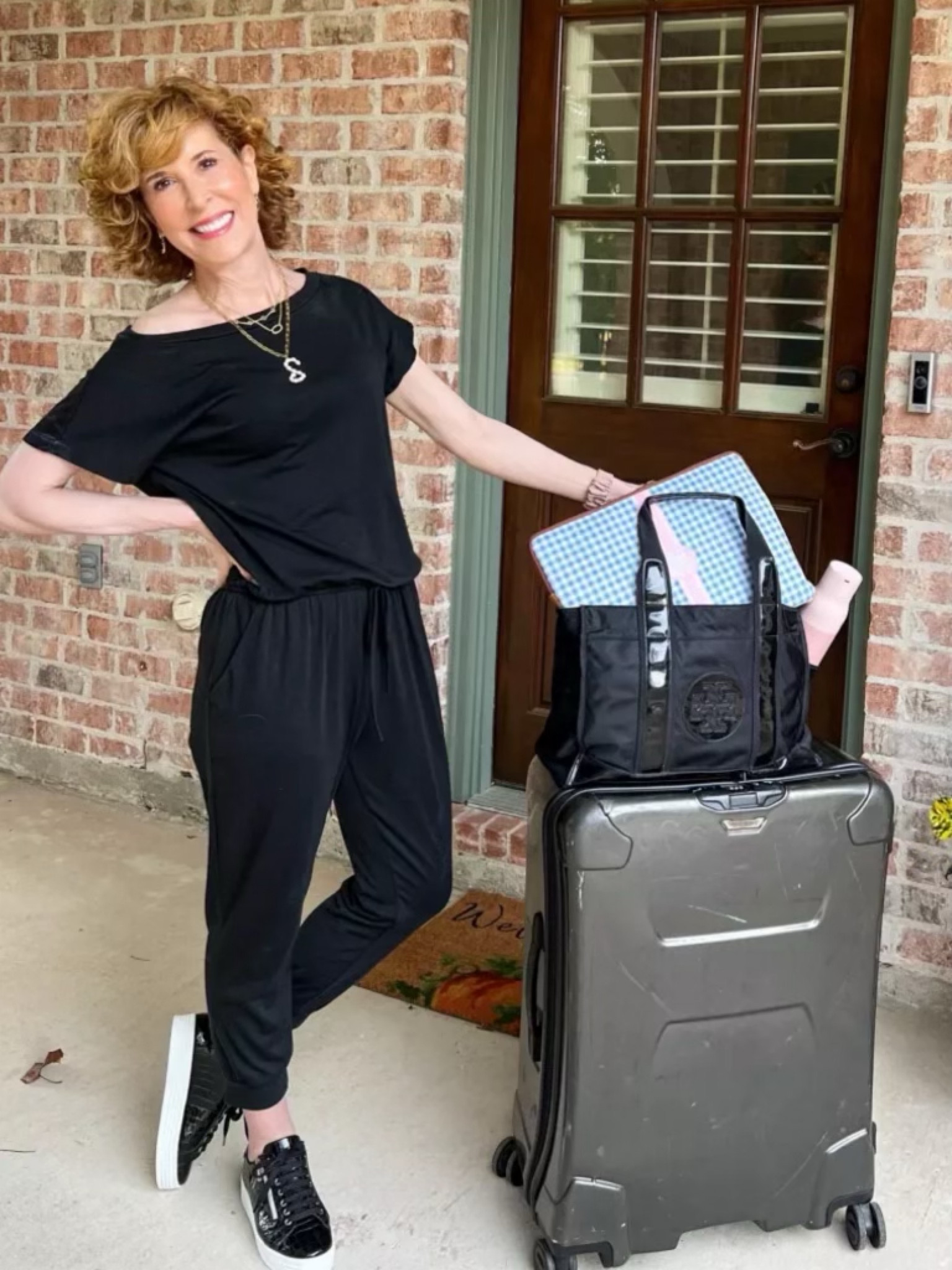 I love this casual black jumpsuit for travel! It's comfy but looks pulled together too! I paired it with black patent sneakers and have my favorite luggage & travel accessories with me as wel
My custom laptop case is really special! Click through below to design your own!

#LTKstyletip #LTKtravel #LTKshoecrush