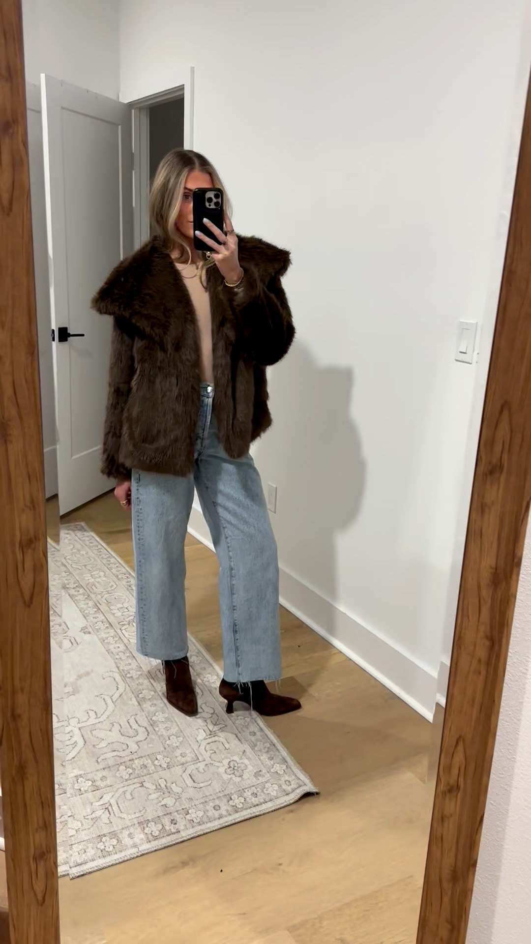 Friday night outfit. My jacket is amazon size small Cicy Bell Womens Faux Fur Coat Winter Shaggy Casual Oversized Lapel Jackets Warm Fuzzy Outerwear. My jeans are size 24 from pistola. My bodysuit is size XS skims dupe from amazon they are PUMIEY. My boots are Dolce Vita 

#LTKFindsUnder100 #LTKootd #LTKSeasonal