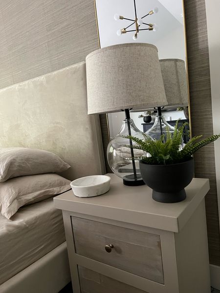 Styled nightstand. I have a couple of these black planters from Walmart. I love the shape! 
Bedroom inspiration 

#LTKGiftGuide #LTKFind #LTKhome