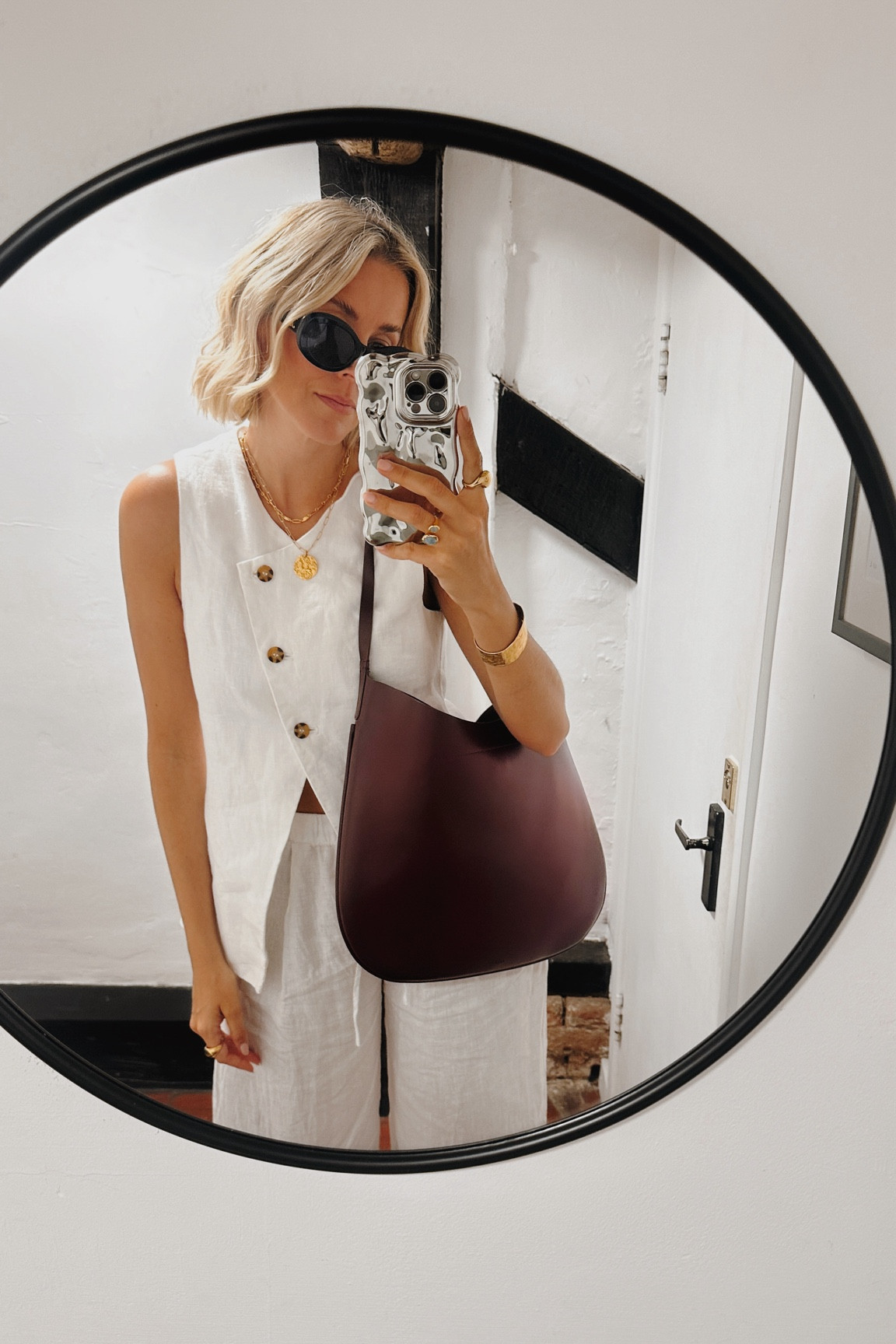 White linen waistcoat
Linen trousers 
Burgundy bag
Leather maroon bag 

#LTKautumn #LTKsummer #LTKuk