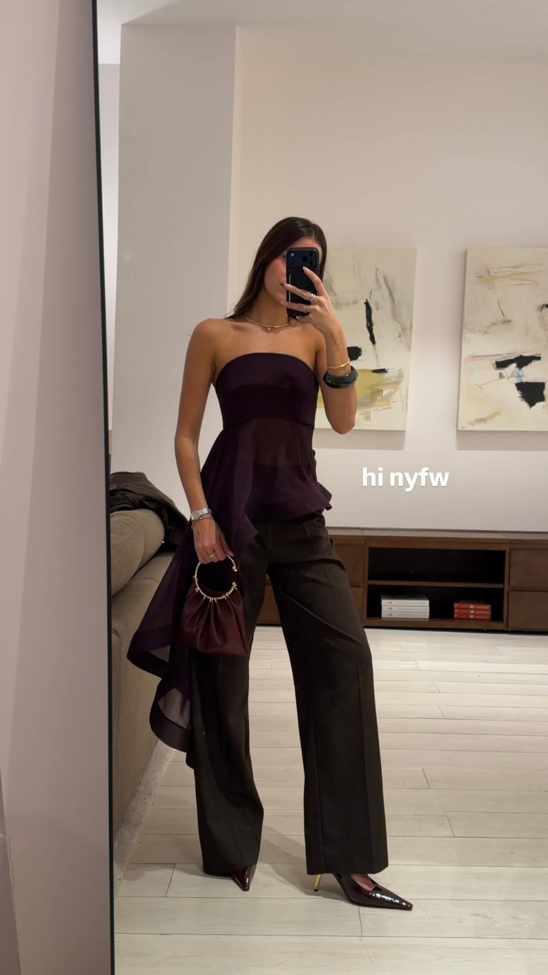 Hi NYFW ✨ Starting the week in this burgundy asymmetrical top (50% off), tailored trousers, matching burgundy slingback heels, and my Verafied NY mini statement bag to tie it all together. 

 #LTKNYFW #LTKgrwm #LTKootd