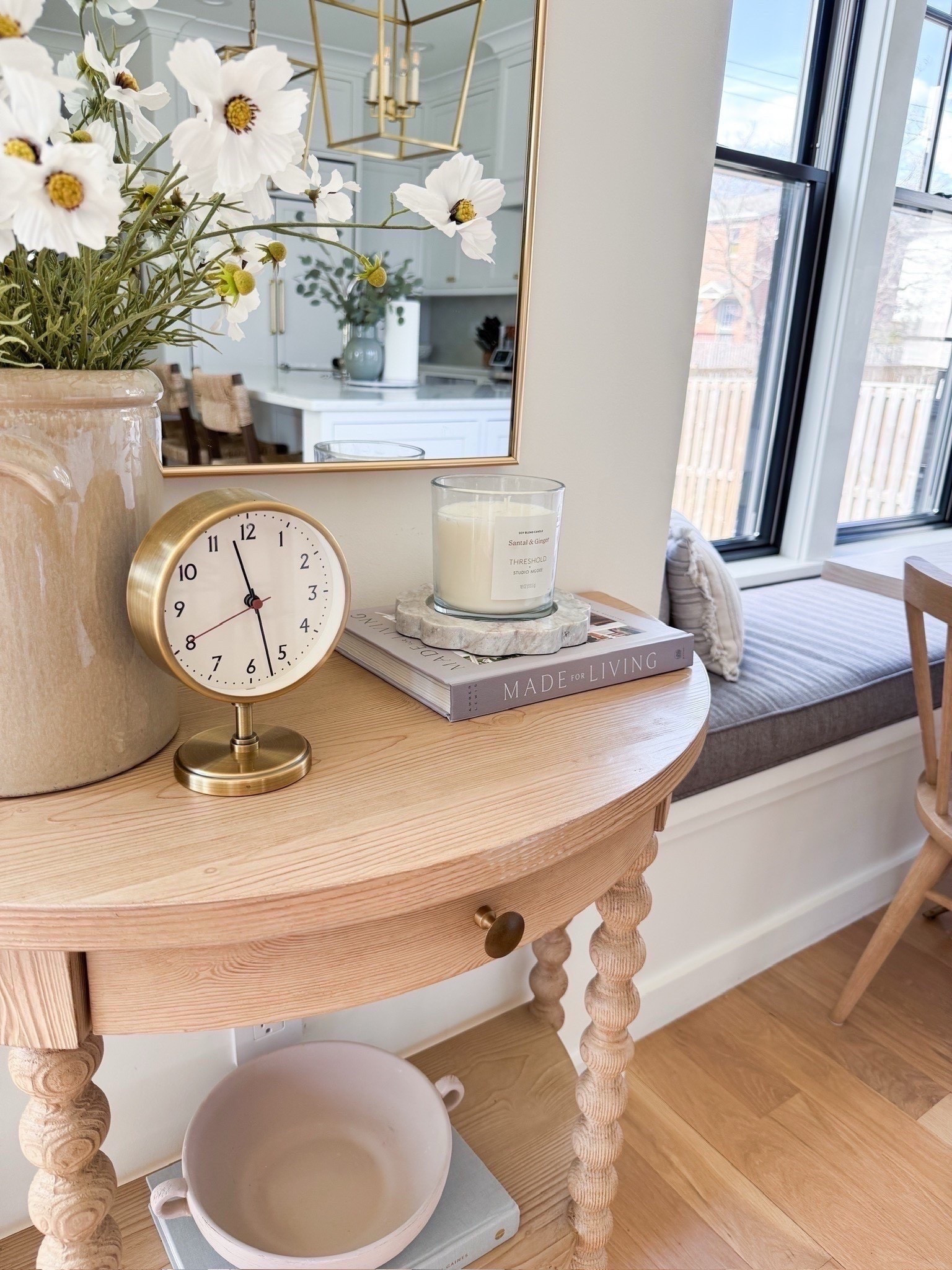 Breakfast nook with linear chandelier. Demilune light wood console table from Serena and Lillie. Look for less signs. Modern coastal, traditional home, home before, home decor styling. 

#LTKHome #LTKSeasonal