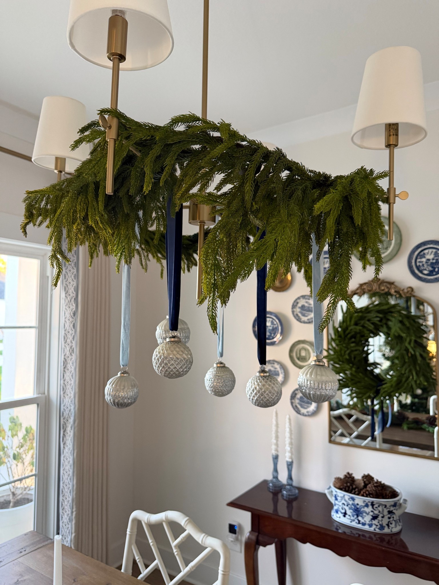 Christmas garland and ornament light fixture 🩵✨ #christmasdecor

#LTKSeasonal #LTKHoliday #LTKHome