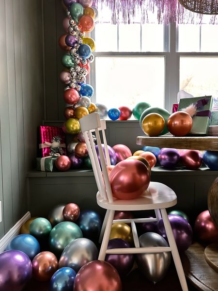 A very inexpensive way to make a big impact when it comes to birthday party decor is balloons. And everywhere - on the floor, on the chairs and on garland going up the walls. These metallic balloons were GORGEOUS. All I needed was one pack of each size. But the electric balloon pump is a must! 

#LTKkids #LTKhome #LTKparties