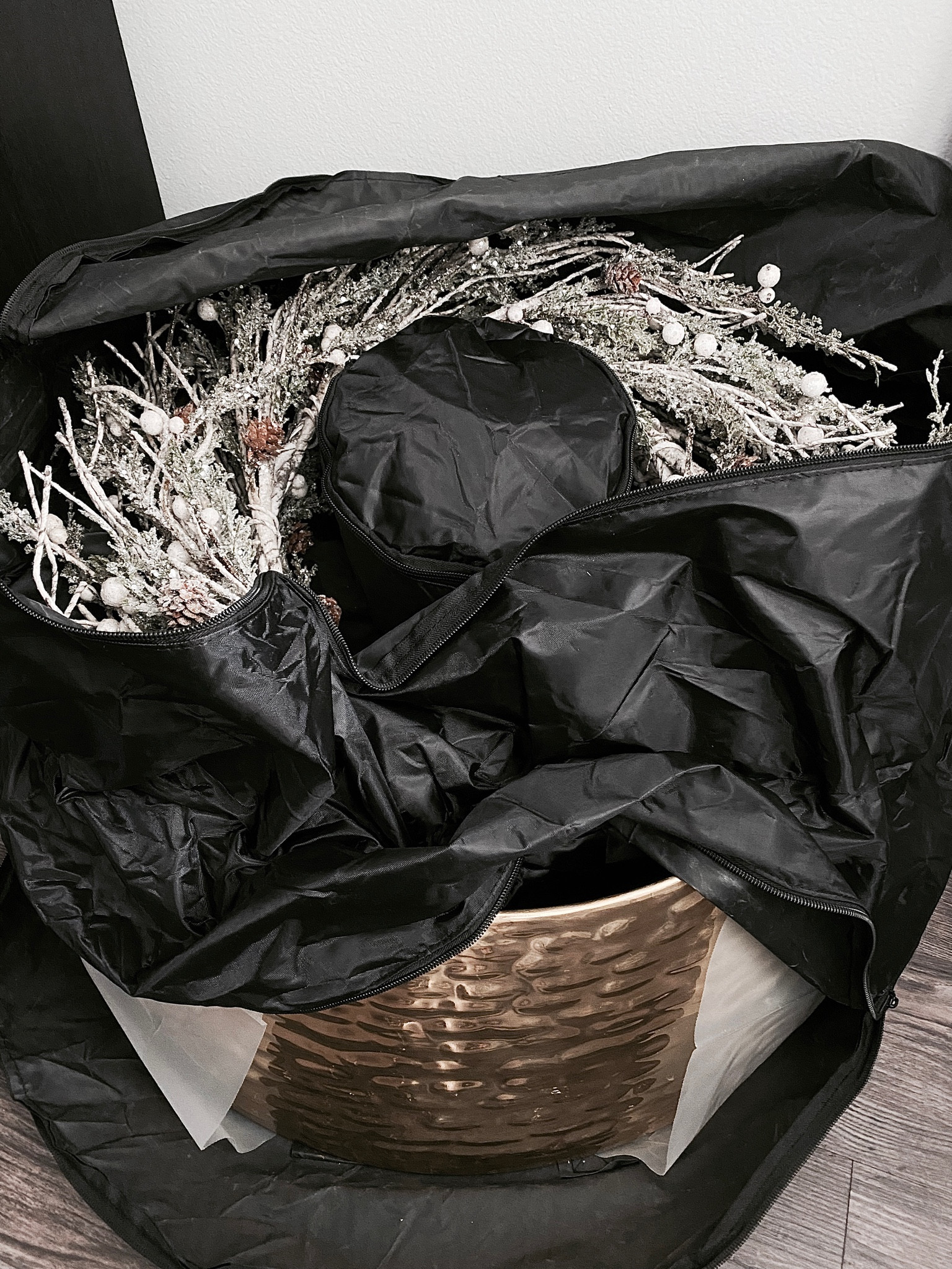 Putting away winter decor and I bought this double wreath holder to store my winter/Christmas wreaths.

Turns out it fits my brass Christmas tree collar too! Winning!!!

#LTKunder50 #LTKunder100 #LTKSeasonal