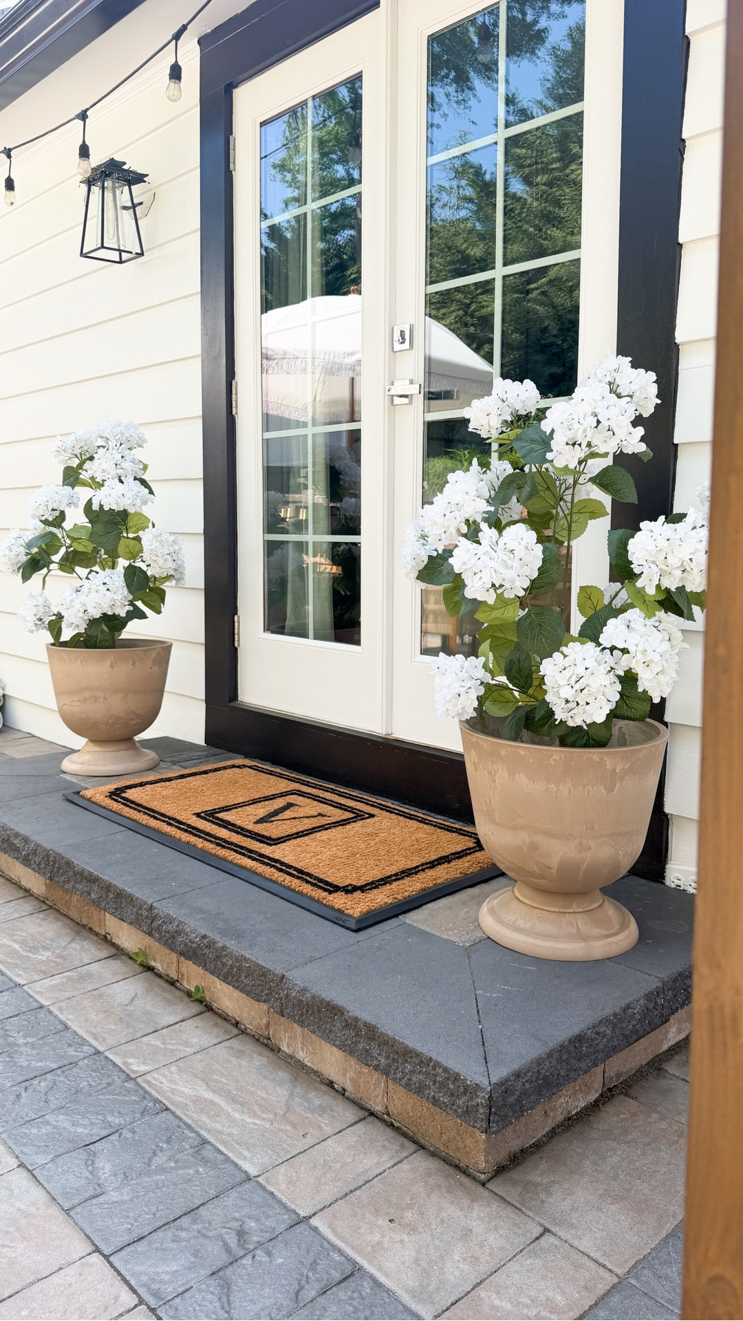 #Ad Sometimes the smallest outdoor updates make the biggest difference. ✨🌿

I wanted our backyard entry to feel more elevated and welcoming for summer, and these @Wayfair wayfair pieces completely transformed oir space.

From the oversized hydrangeas and planters to the doormat and lighting details, everything came together to create that cozy designer-inspired look I love. 🌿🤎

Best part… Wayfair’s Hot Summer Sale is also happening right now, making it the perfect time to refresh those overlooked outdoor spaces before summer hosting season officially begins. ☀️

#Wayfair #WayfairPartner #OutdoorRefresh #OutdoorDecor #BackyardInspo #OutdoorLiving

#LTKSaleAlert #LTKHome