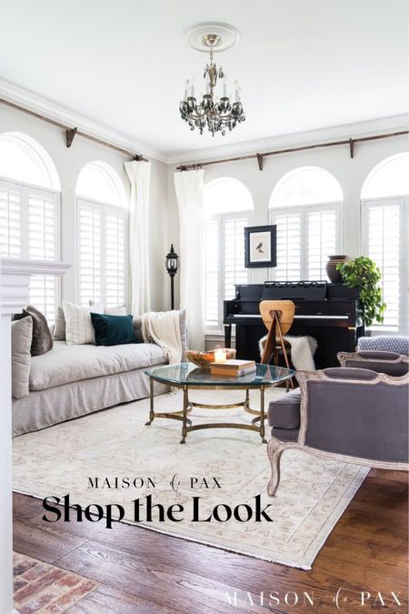 Working on making your living spaces cozy for the fall and winter seasons? These touches can make that possible! Pillows, living room, grey chairs, neutral rug, moody

#LTKSeasonal #LTKhome