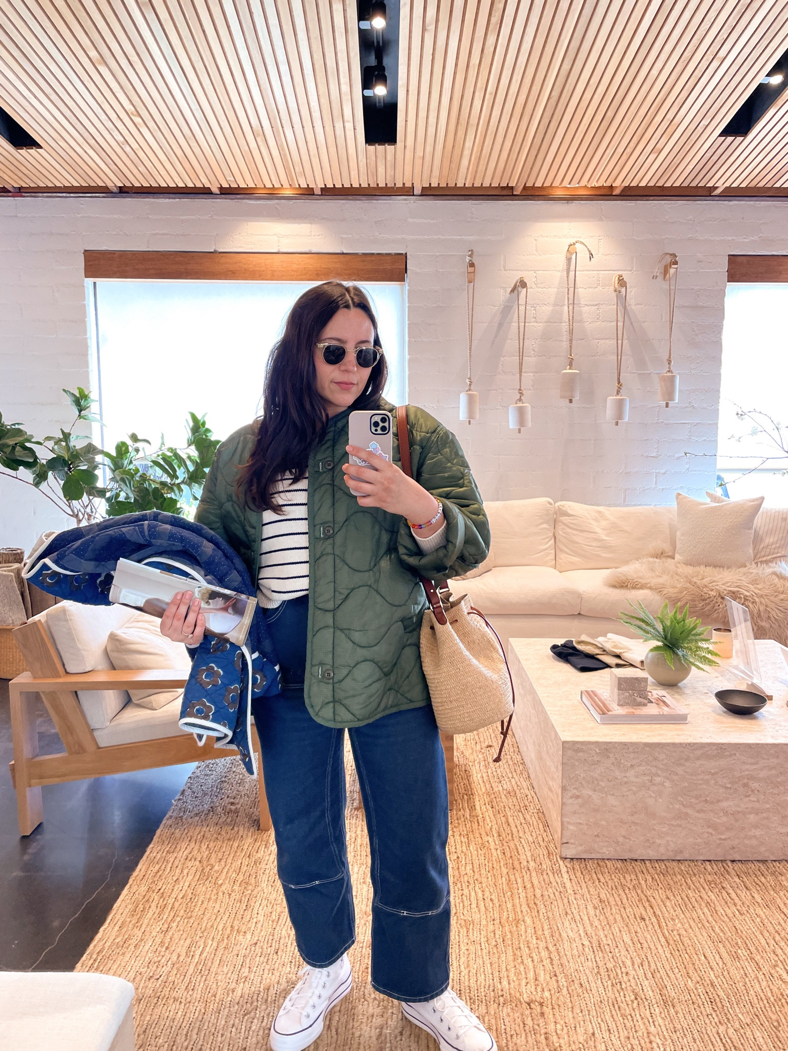 Puffer over sweater with a touch of spring. And, ready to move into the Jenni Kayne store 😂 

#LTKstyletip #LTKitbag #LTKSeasonal
