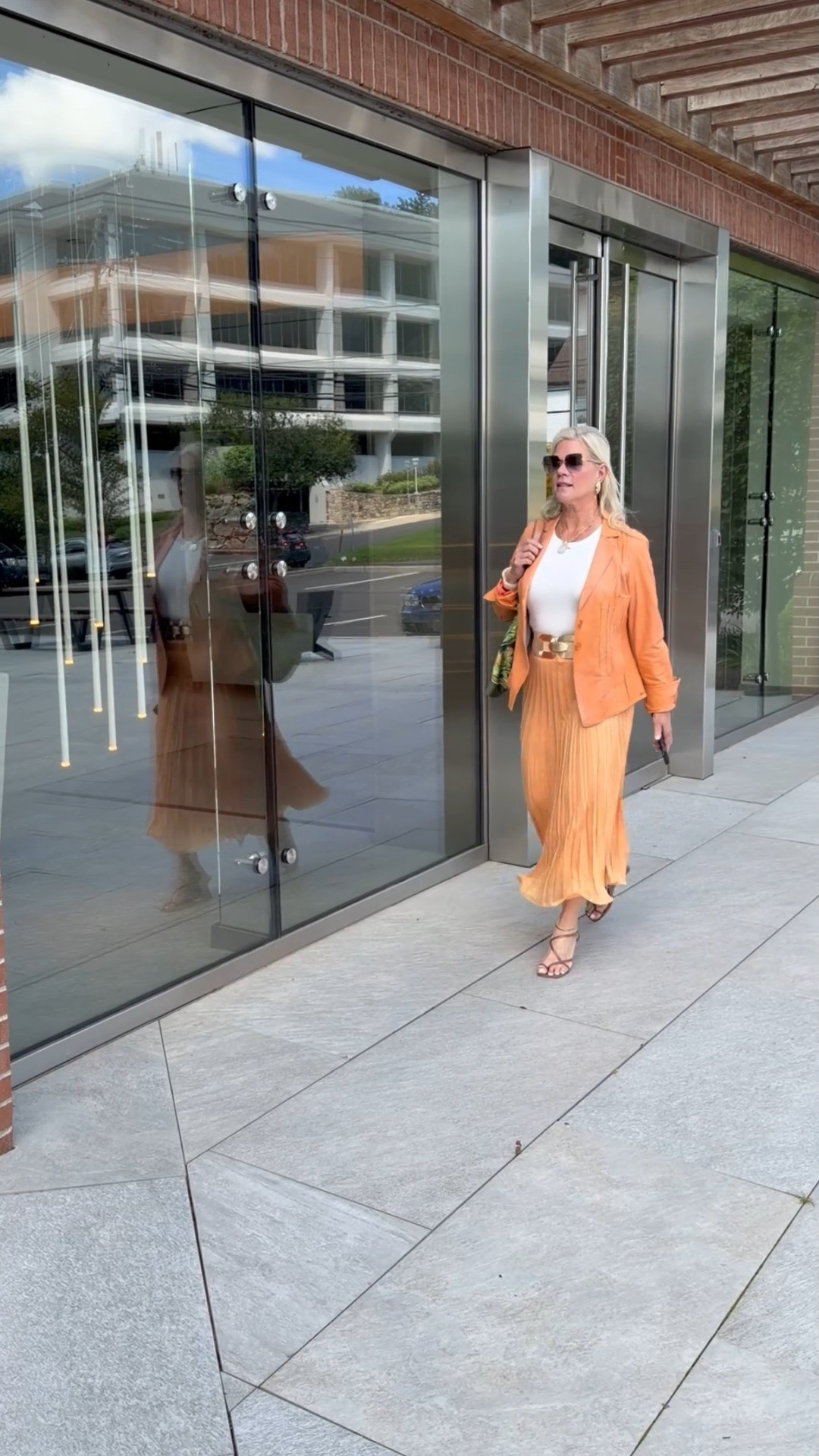 Transitioning to fall doesn't mean packing away bright colors just yet. 

Pairing an apricot pleated midi skirt with a tailored peach blazer and a gold waist belt creates the perfect bridge between warm afternoons and crisp fall days.

Comment OUTFIT below for direct links to this entire look! :point_down:

Follow along for more easy transitional style inspiration.

Keep it simple, sunshine. 🌞

#FallFashion #TransitionalStyle #StyleOver50 #WomenOver50 #TuesdayStyle 

 #LTKootd #LTKSeasonal #LTKOver40