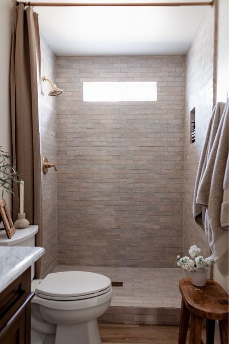Shop our bathroom decor including this Amazon shower curtain, my favorite bath towels, and gorgeous wood vanity, and Target accent stool! 

Our shower trim kit from Kohler is currently on sale 🎉

Tile: Natural White Zellige from RiadTile.com 🤍

#neutral #decor #organic #modern #summerr

#LTKsalealert #LTKfindsunder100 #LTKhome