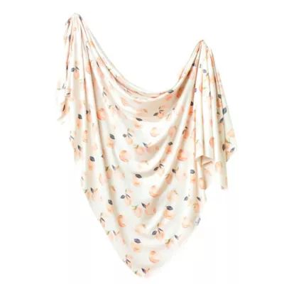 Copper Pearl™ Caroline Peach Swaddle Blanket in Orange/White | buybuy BABY