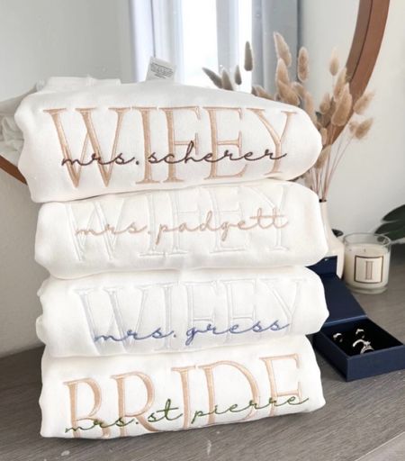 Personalized Embroidered Wife Sweatshirt by SoulmadeDesignsLA

 Custom last name Sweatshirt | Bridal Sweatshirt | Engagement
Sweatshirt Bride I White wifey sweatshirt | engagement gift | gift for bride | bridal shower | bachelorette 


#LTKwedding #LTKGiftGuide #LTKstyletip