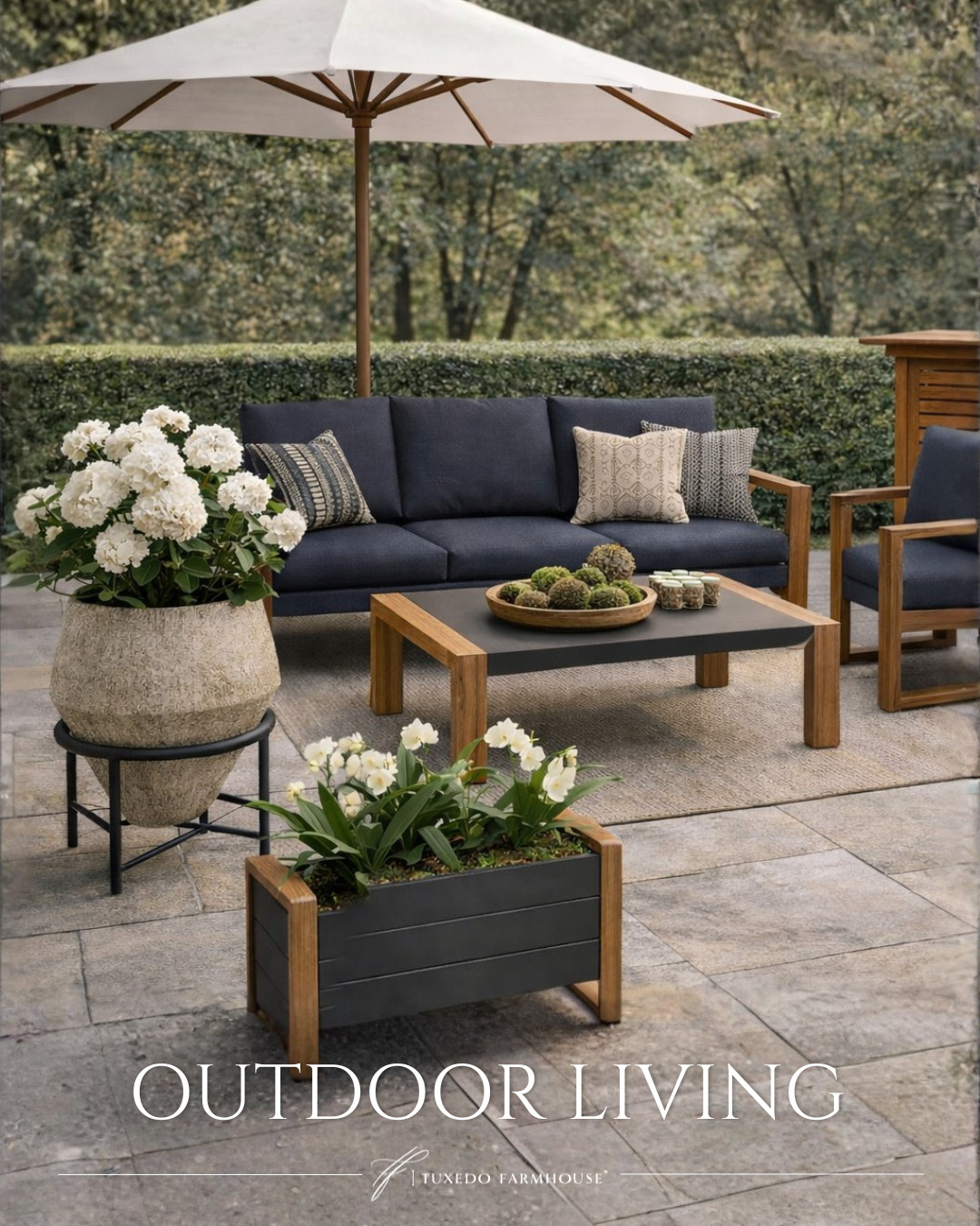 Elevated outdoor living 🌿✨

Bring resort-inspired comfort home with this modern patio set featuring deep navy cushions, warm wood tones, and statement concrete accents. The oversized planters with lush white hydrangeas add fresh spring texture, while the sleek bar setup makes entertaining effortless. Timeless, durable, and designed for relaxed gatherings all season long.

#LTKHome #LTKSeasonal #LTKSaleAlert #outdoorliving #patiodecor #springrefresh #backyardstyle #entertainingathome 

 