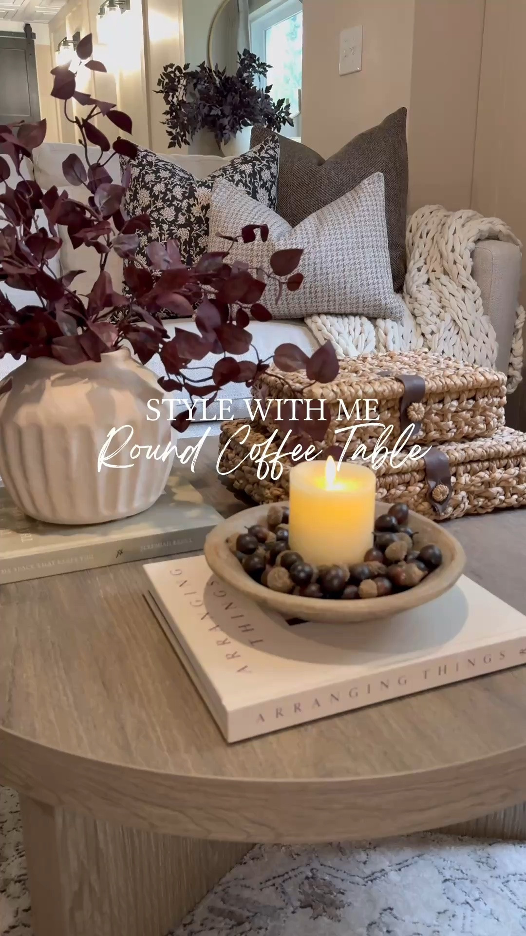 Cozy Fall Coffee Table Styling 🍂

A few simple layers are all it takes to bring that warm fall feeling into the living room. Rich burgundy stems, woven textures, cozy pillows, a chunky knit throw, and the prettiest little acorn filler around a flickering candle make this space feel ready for the season.

I love mixing everyday pieces with subtle fall touches for a look that feels cozy, collected, and easy to recreate.

#FallDecor #FallHome #CoffeeTableStyling #FallDecorating #CozyHome #AutumnDecor #HomeDecor #FallInspiration

#LTKSeasonal #LTKSaleAlert #LTKHome