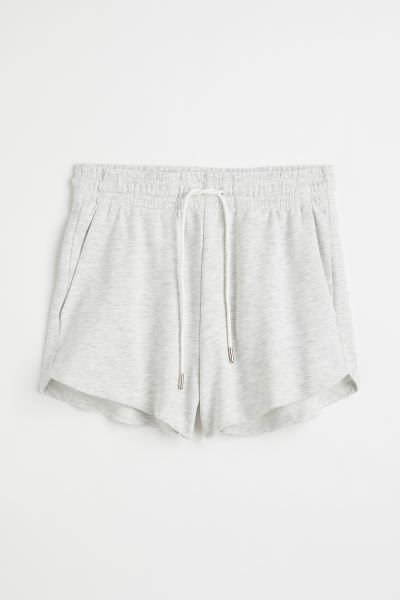 Lightweight sweatshorts made from a cotton blend. High waist, covered, elasticized waistband with... | H&M (US + CA)