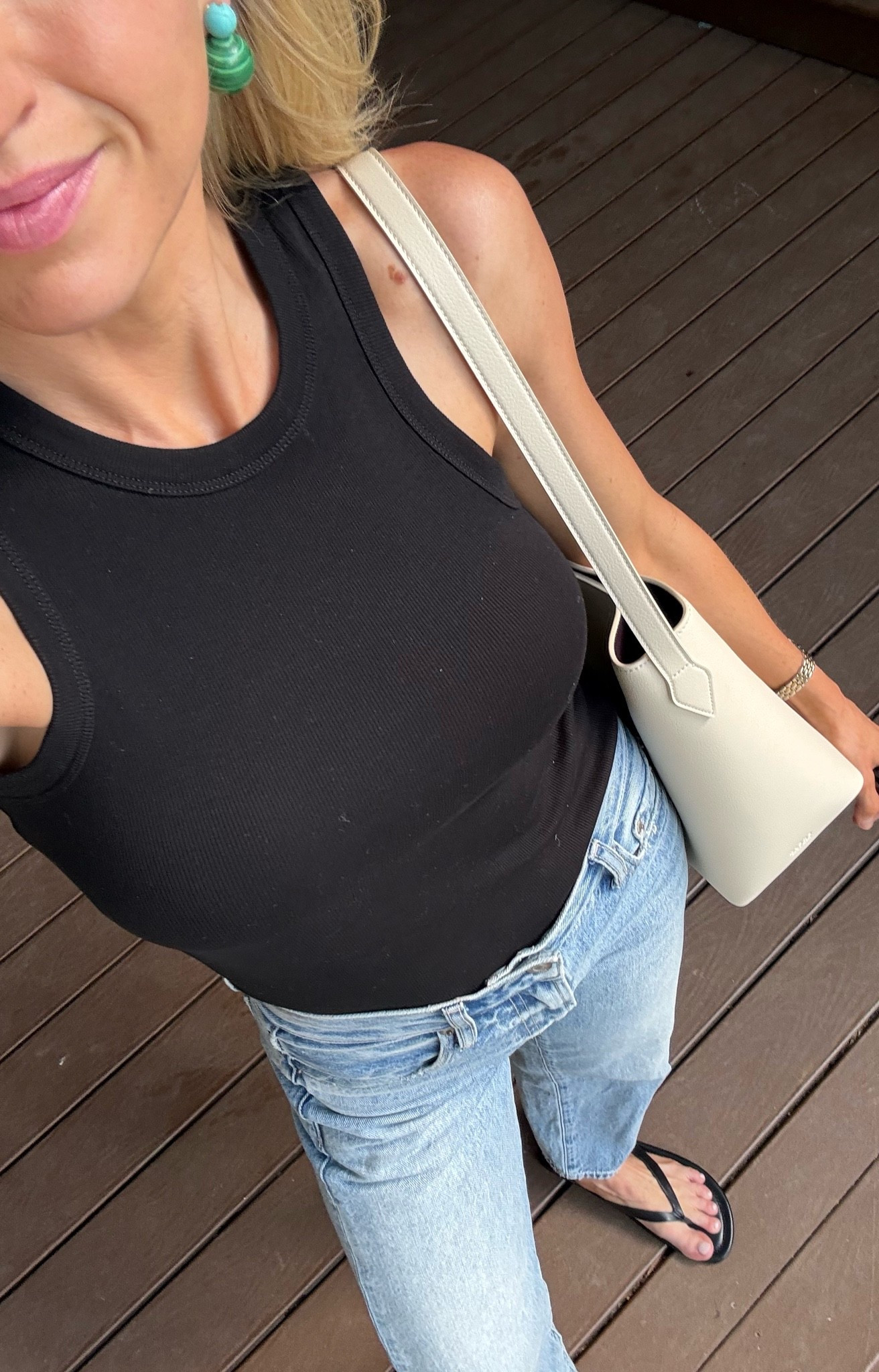 A simple black tank and denim = chic summer outfit

Black tank - true to size
All time favorite denim! - size down one - I’m
In a 24