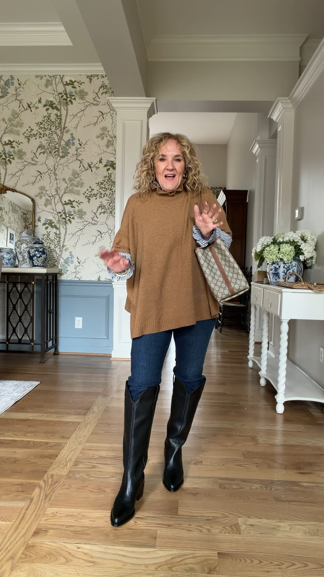 Thoughts on the tall boots and jeans? I think this poncho and tailored blouse is a fresh take! 
Boots I ordered a 9. I’m usually a 9.5 
Blouse size medium 
25% off my jewelry Allie & Bess NANETTE25

Winter outfit poncho black boots @quince @jcrewfactory

#LTKSaleAlert #LTKOver40 #LTKSeasonal
