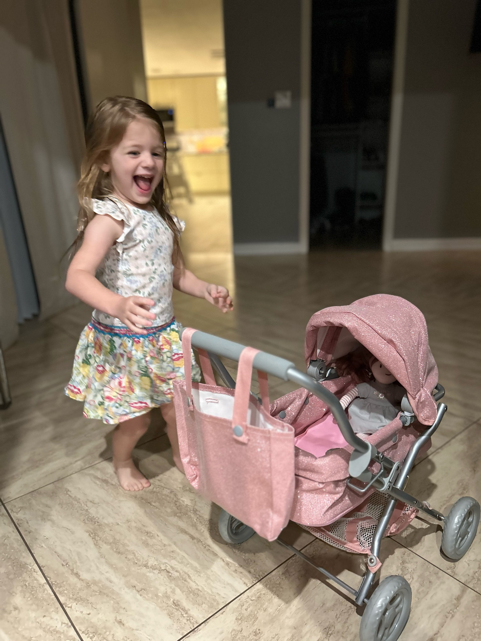 Obsessed with how my little one is loving her new pink glitter doll stroller from Pottery Barn Kids! ✨ She can’t wait to stroll her dolls around the house, and it’s the perfect addition to her playtime. 💕 #PotteryBarnKids #LTKFamily #ToddlerPlay #PinkPerfection #MomLife

#LTKKids #LTKFamily