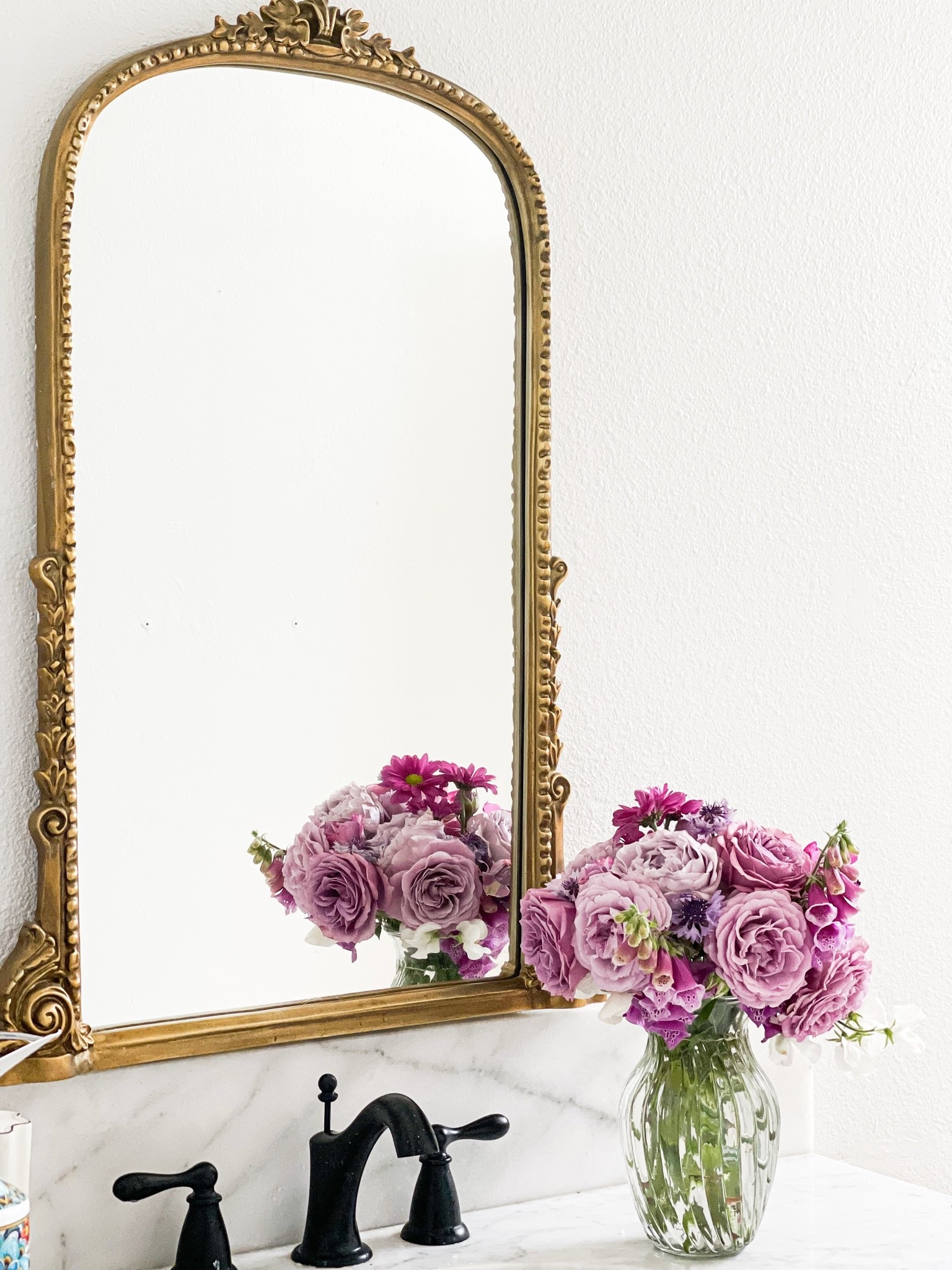 My gorgeous gold ornate mirror is on sale! It is perfect for a bathroom, a hallway, a bedroom and more! It looks great over my beautiful bathroom vanity in my guest bathroom. Use coupon code Anthro20 to save. 💗

#LTKdayinmylife #LTKHome #LTKSaleAlert