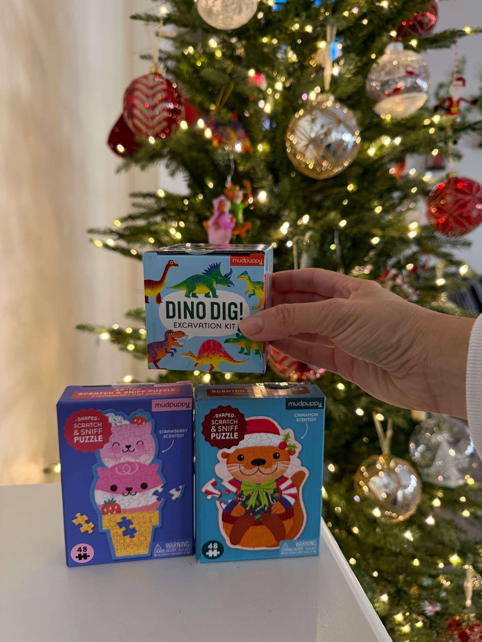 Perfect stocking stuffers for kids scratch and sniff mini puzzles and Dino dig 

#LTKKids #LTKHoliday #LTKGiftGuide