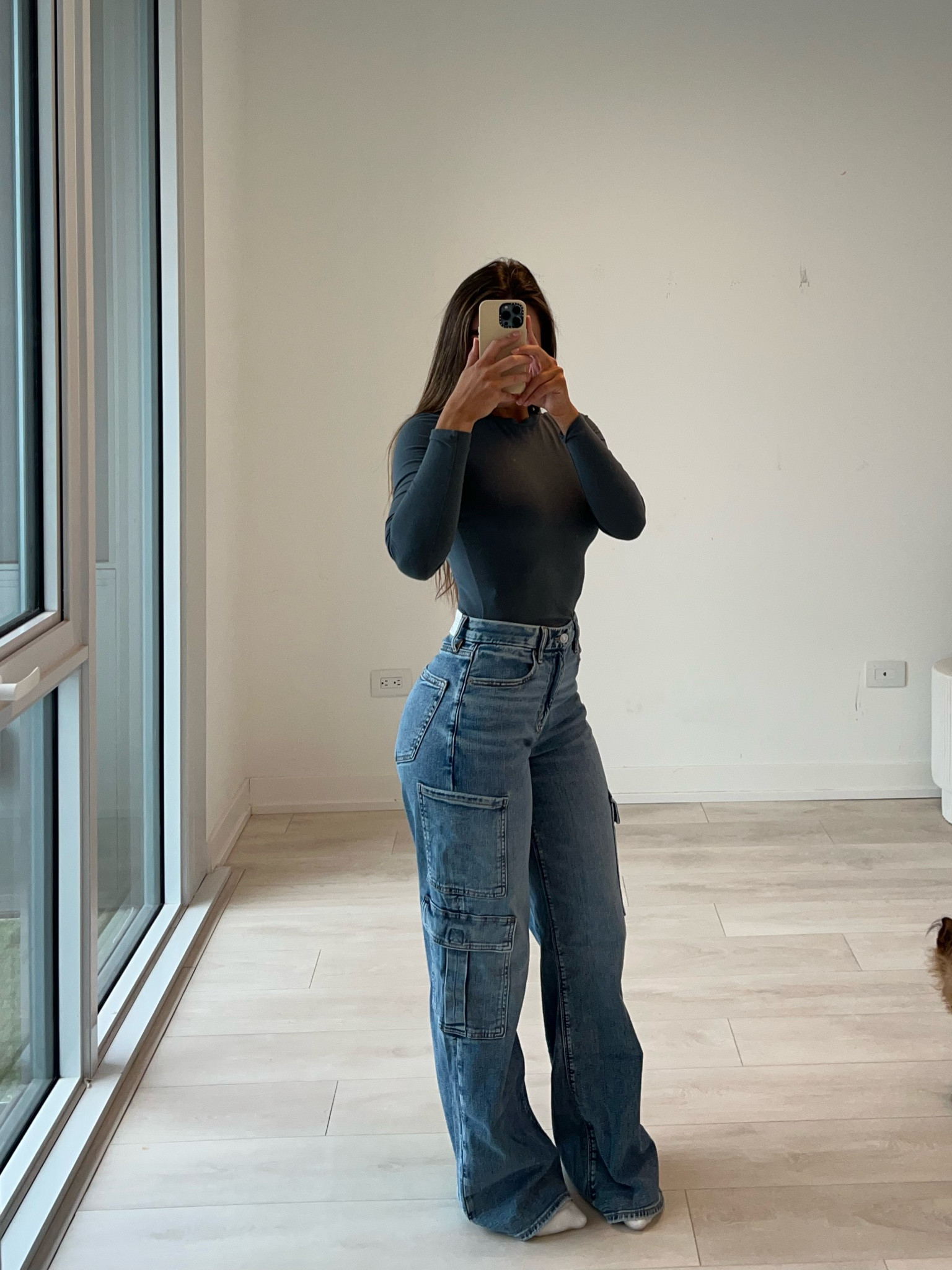Jeans run slightly big, size down! 