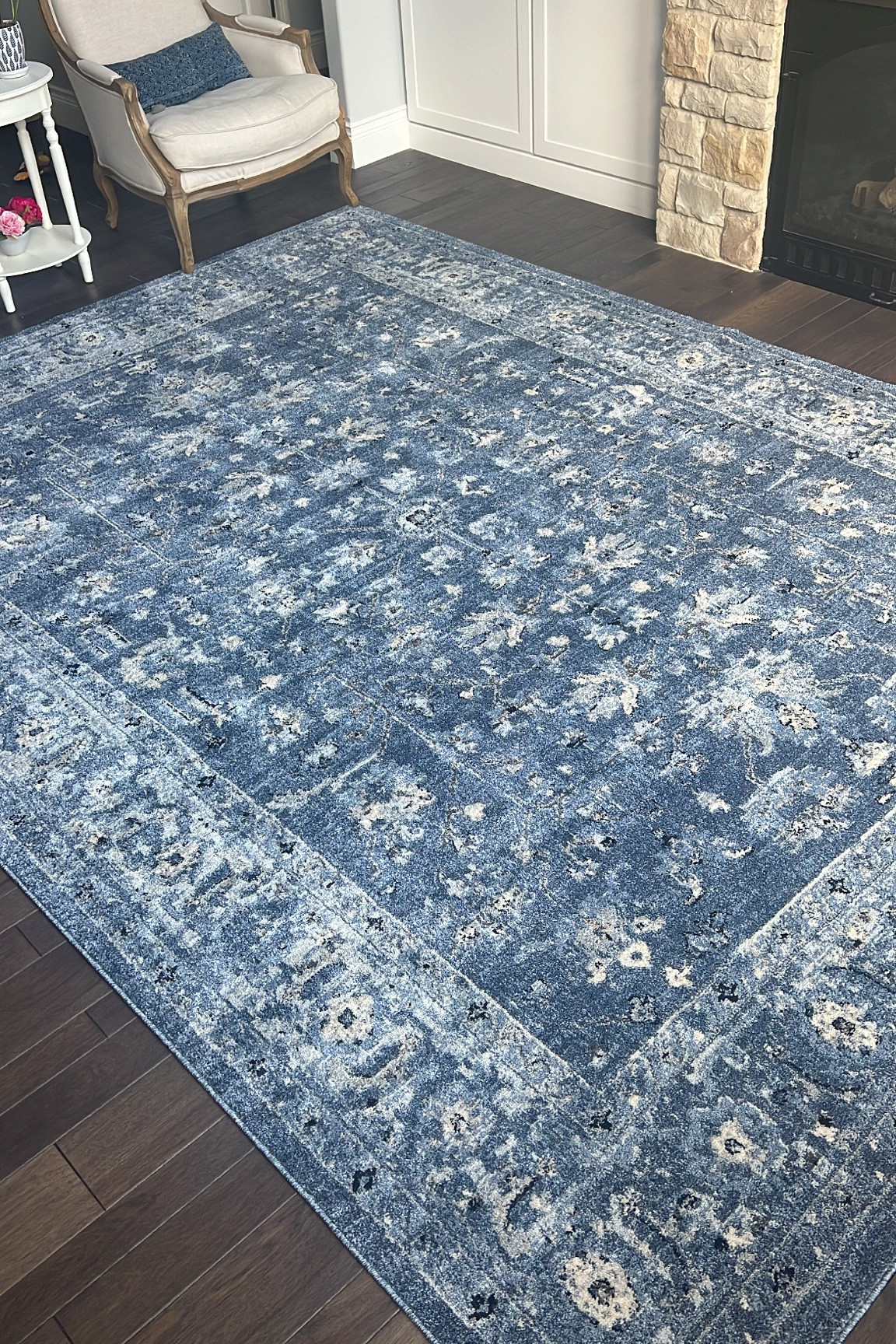 New living room rug. I’m loving the colors - shades of blue mixed with beige, cream and black  