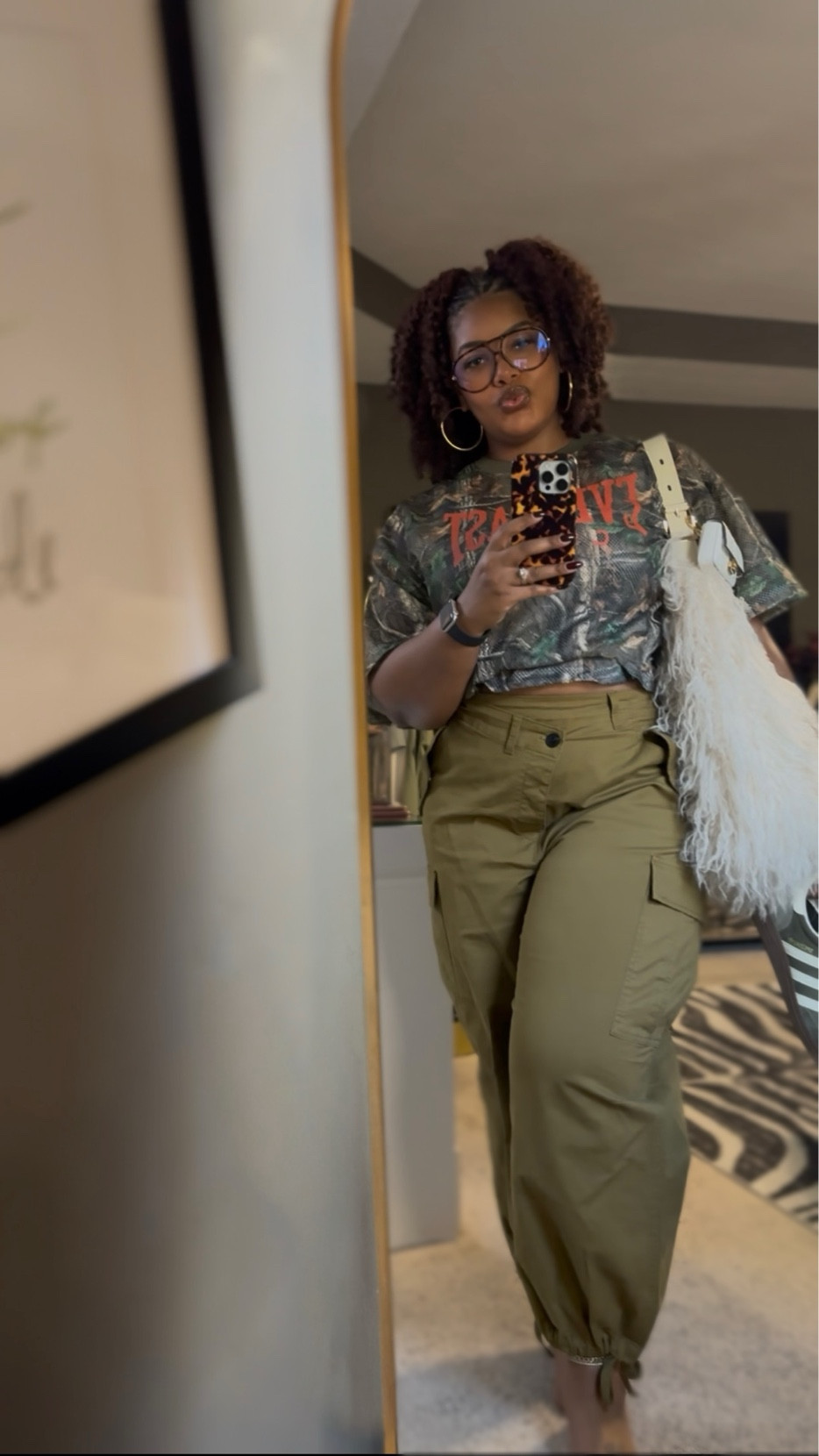 Camo junkie. Worn with sneakers but I would restyle with boots and tuck the joggers. Linking my top choice below.

#LTKSeasonal #LTKOver40 #LTKMidsize