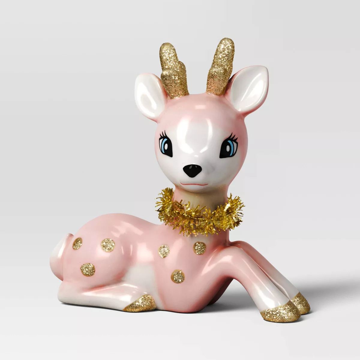 5.25" Ceramic Sitting Reindeer Animal Christmas Figurine - Wondershop™ Pink | Target