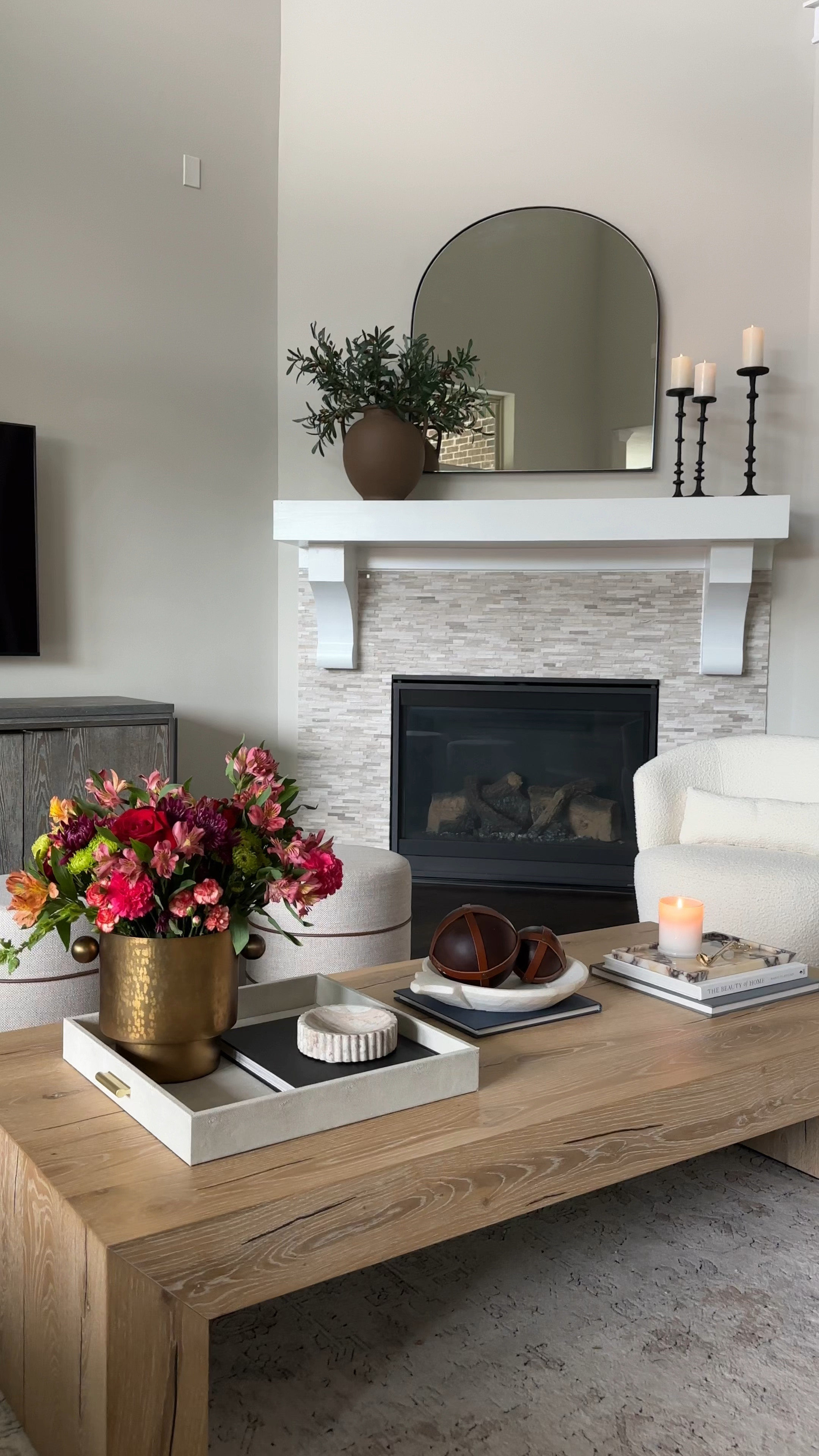 Styling my latest home decor finds from Interior Delights! I am absolutely loving this unique gold vase with the cute knobs!! I added fresh flowers and it looks perfect. The black textured candle sticks are such a pretty staple for your home!! Add them to your mantel, console table or sideboard. I also love how versatile the copper lanterns are… I used them outdoors with candles for a warm glow. Check out these beautiful pieces here. These beautiful pieces were gifted by @interiordelights 

#LTKFind #LTKstyletip #LTKhome