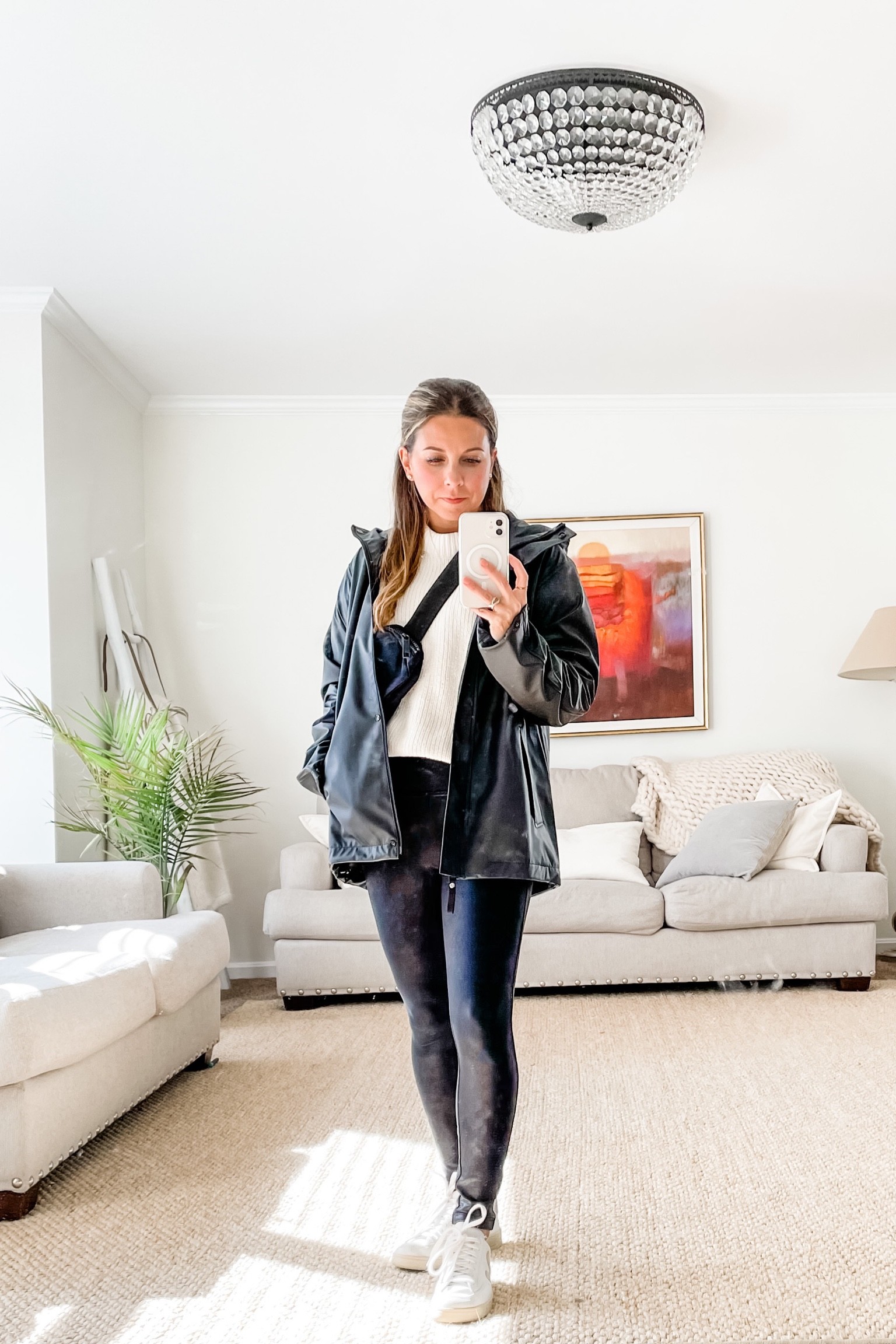 Black coat, black leggings and a black hip bag.

#LTKunder100 #LTKtravel #LTKstyletip