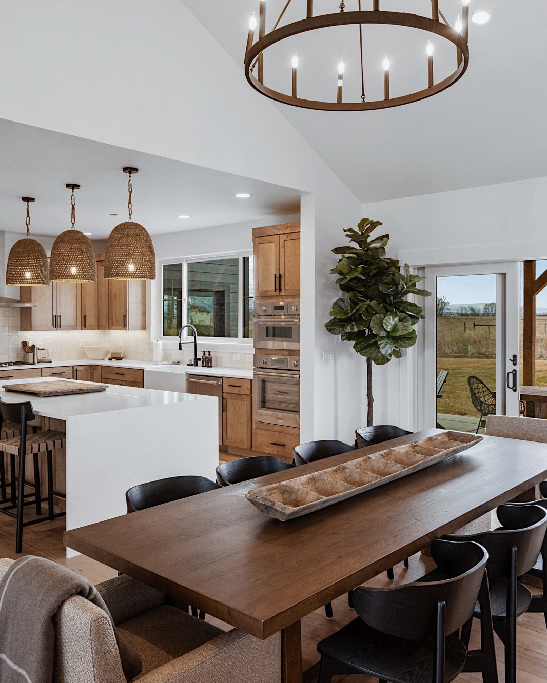 family mountain retreat meets vacation rental 🌄💫

this bozeman, montana residence was designed to be the best of both worlds—a cozy family getaway and a stylish short-term rental. every detail, from the thoughtful interiors to the functional flow, was created with both comfort and hosting in mind.

we transformed this space with a large kitchen island, warm and textured pendant lighting, a dining table that seats ten, and durable, easy-to-clean chairs and barstools—perfect for frequent rentals and large families. 

 #BozemanInteriorDesign #MontanaVacationHome #ShortTermRentalDesign #MountainHomeStyle #TheSyndicateSociety #Airbnb #LTKStyleTip #LTKTravel #LTKHome