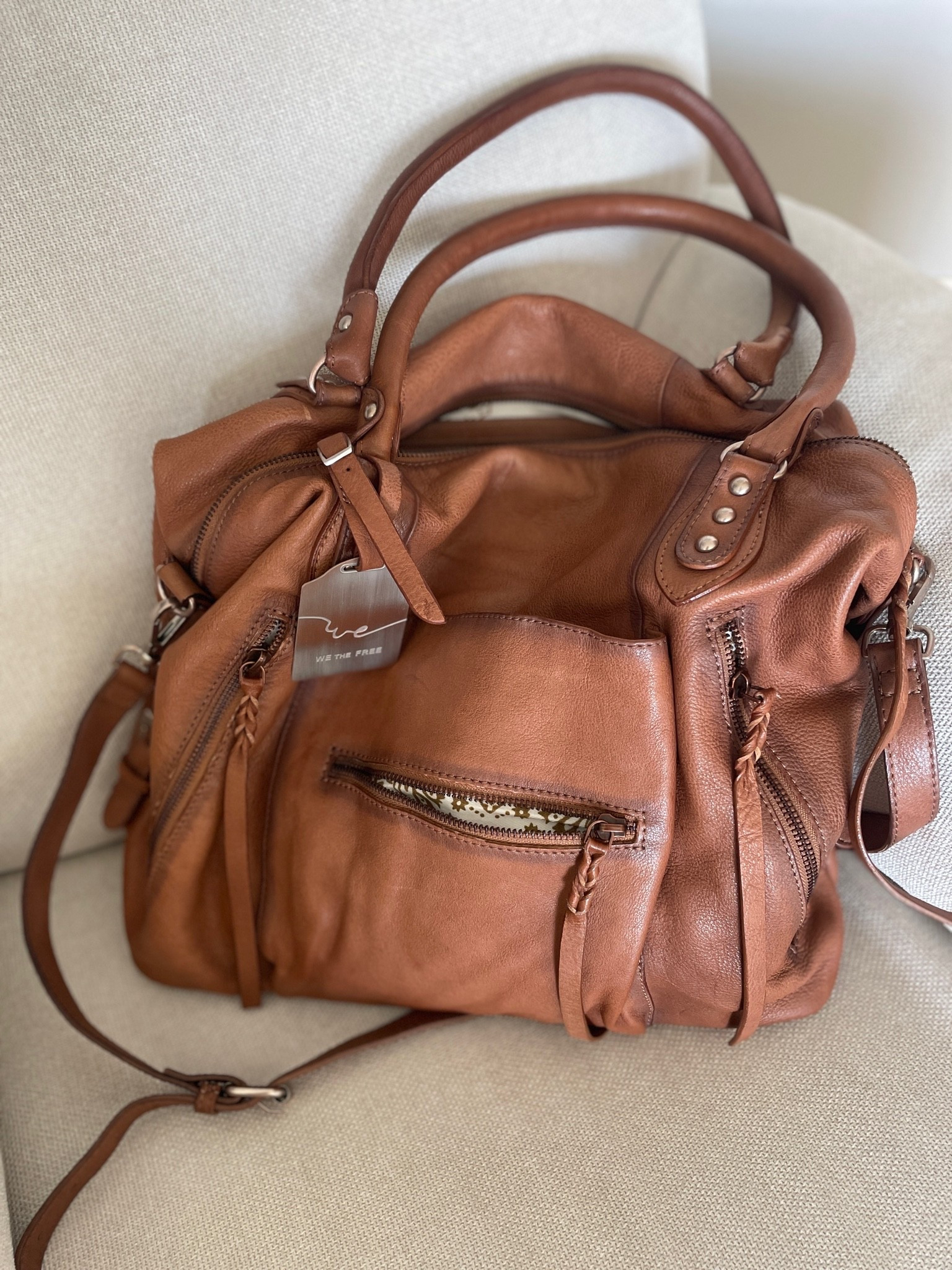 A bag big enough for your entire life, cute enough for every outfit. 

I have the tote bag that fits my laptop, planner, and all the toddler gear. 

If this seems too much they have the “baby” one too. I also linked it.