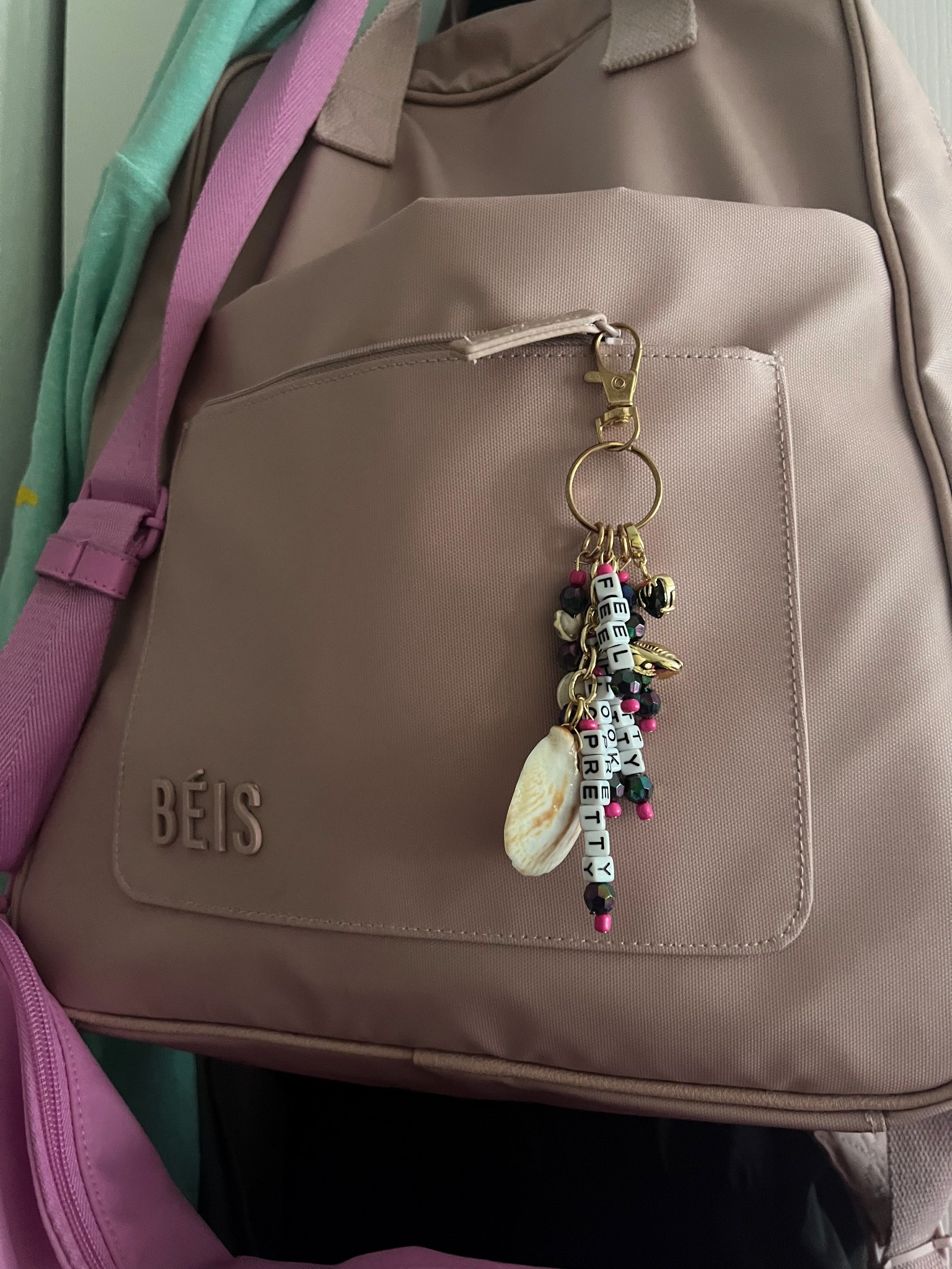 Love a good bag charm and the beis expandable is my FAVORITE.  Its so prefect for travel and fits so much !  The packing cubes help me stay organized and the dopp kit holds my dyson!
#summervacation #travel #bags #travelbags #beis #backpack #summertravel #summer #expandable #baggage #carryon #travelneeds #packinghacks #packing #packingcubes #doppkit #dopp #atlaspink 

#LTKStyleTip #LTKItBag #LTKSummerEdit
