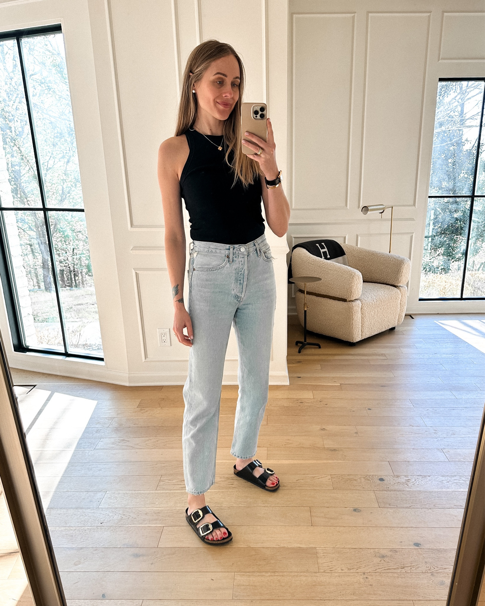 Fashion Jackson wearing spring outfit, capsule, AGOLDE jeans, black tank top, black sandals, Birkenstock, #Shopbop #fashionjackson #springoutfits #sandals

#LTKstyletip #LTKunder100 #LTKshoecrush