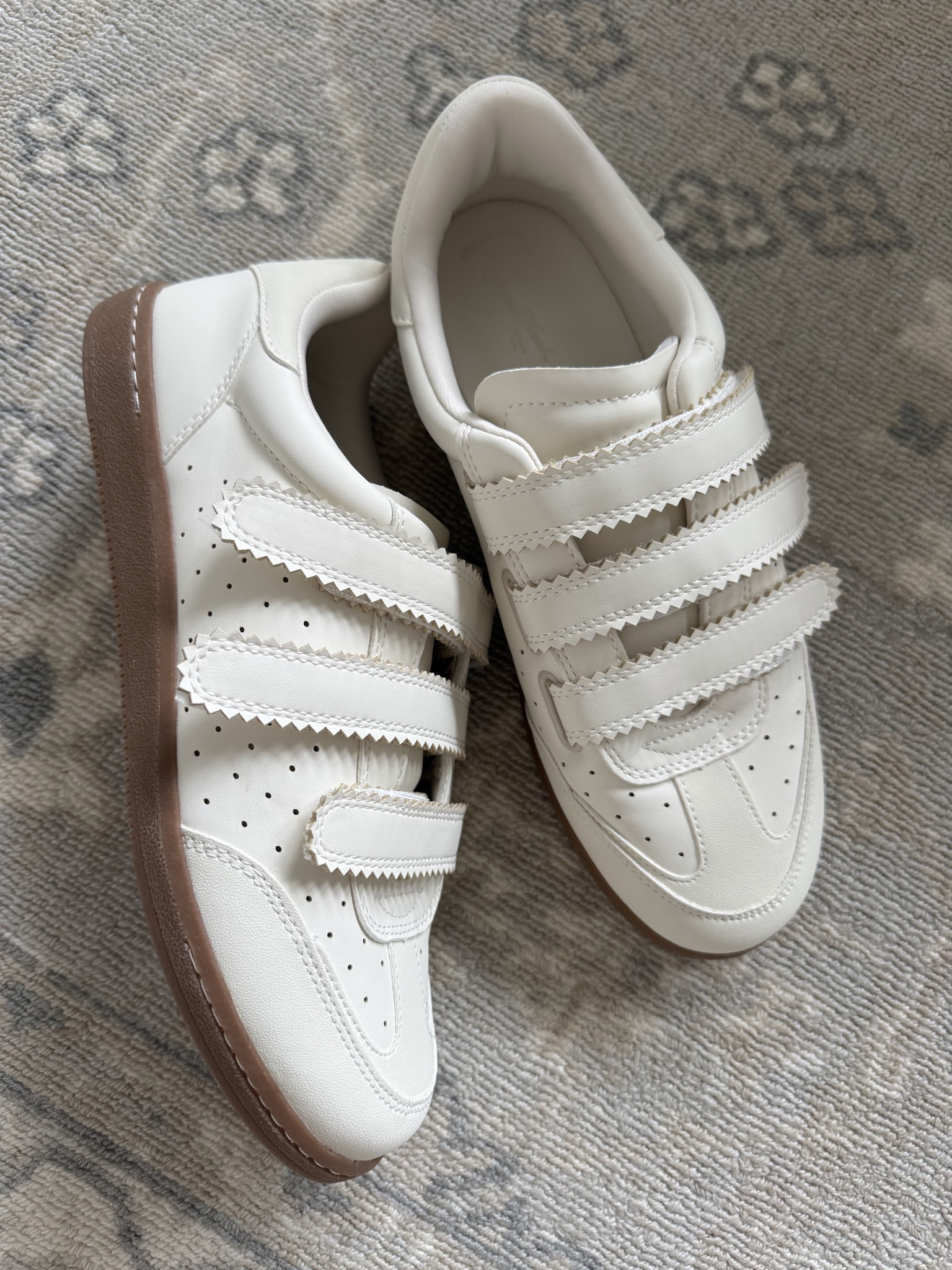 These sneakers are so comfy!! Run tss but size up gals if you plan to wear a sock. They’re an Isabel Marant sneaker look for less

White sneaker // mom shoe // casual spring shoe 

#LTKSeasonal