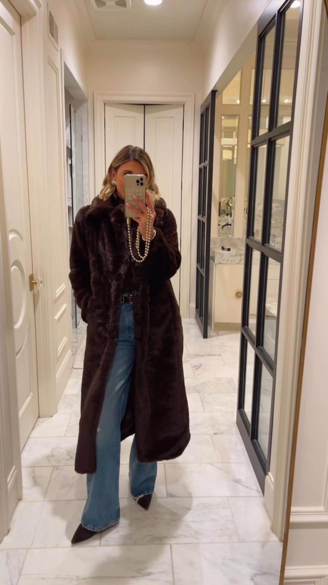 Love this long faux fur jacket! It's so warm. I'm wearing size small and am 5'7 for reference 