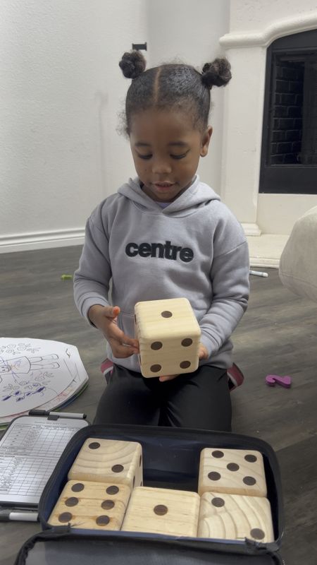 Gift Idea! We bought these last year as a gift for the kids to add to their at home games and we still love them. Zoe was home sick and we played with the dice. Linking some game gift ideas for you guys. They are always good to have on hand and great for reducing screen time 

#LTKGiftGuide #LTKfindsunder100 #LTKHoliday