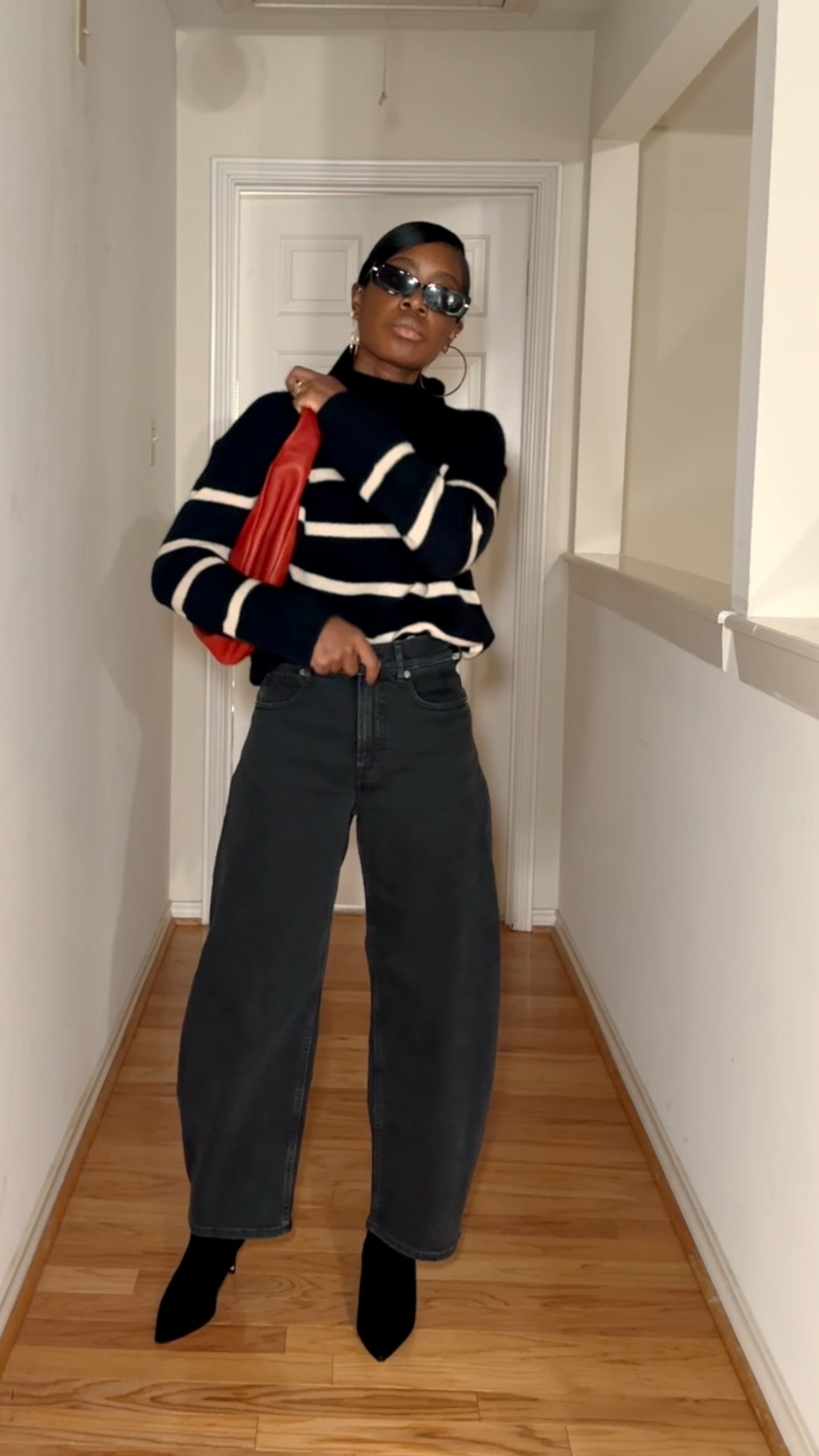 Striped turtleneck cashmere sweater red bag and barrel leg jeans 

#LTKFindsUnder100 #LTKStyleTip