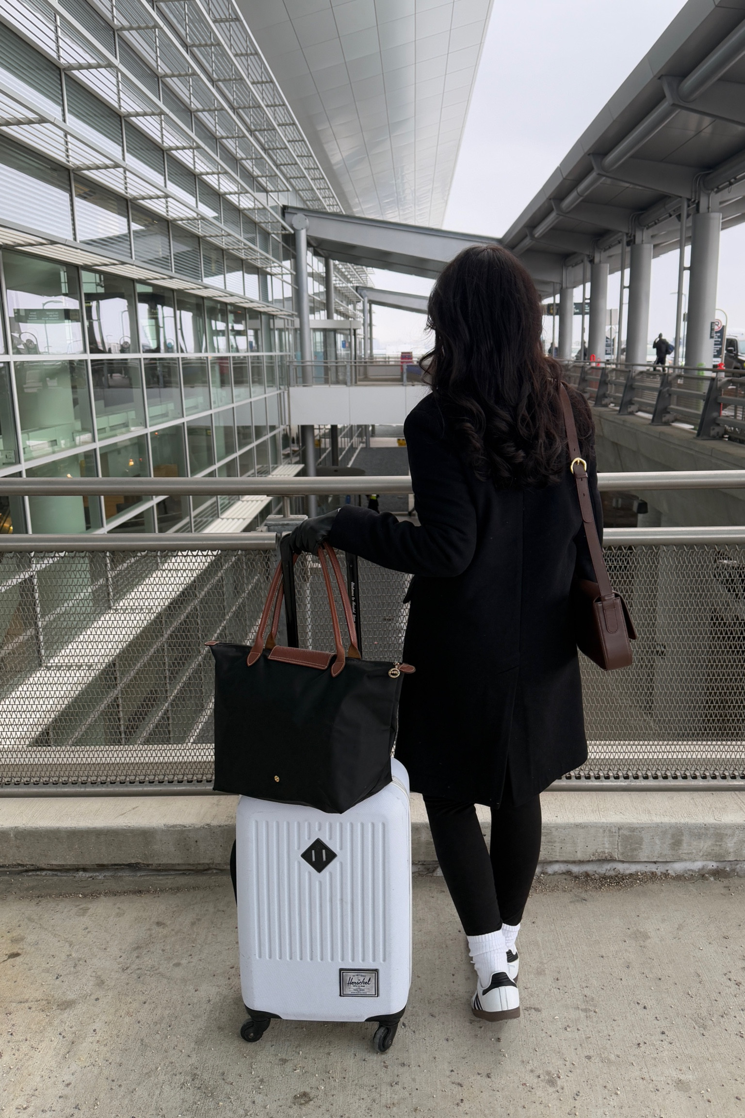 Coat: Wilfred
Leggings: Old Navy
Socks: TNA
Sneakers: Adidas
Bag: A Cloud
Bag: Longchamp
Suitcase: Herschel Supply Co

#LTKcanada #LTKtravel