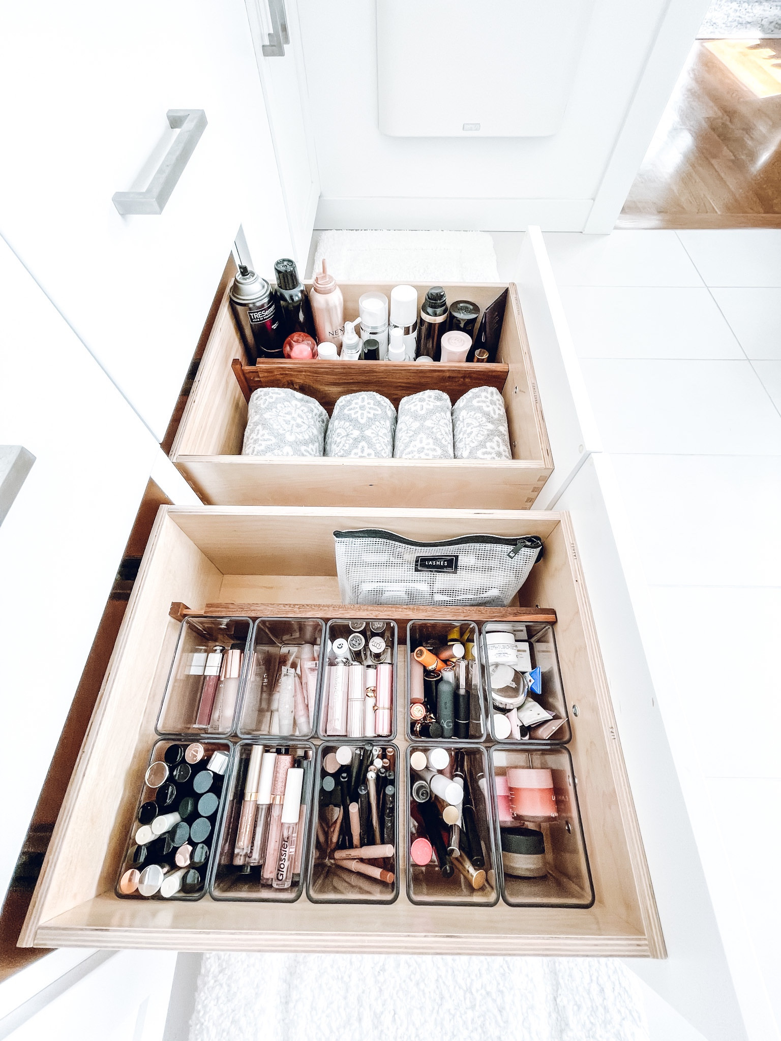 Make up + hair organization. The Container Store Letter-Size pouch. Home Edit tall bin organizer. Amazon Lipper dividers, Brother P-Touch, and Greencycle label tape. Hearth & Hand hand towel✨

#LTKfamily #LTKbeauty #LTKhome