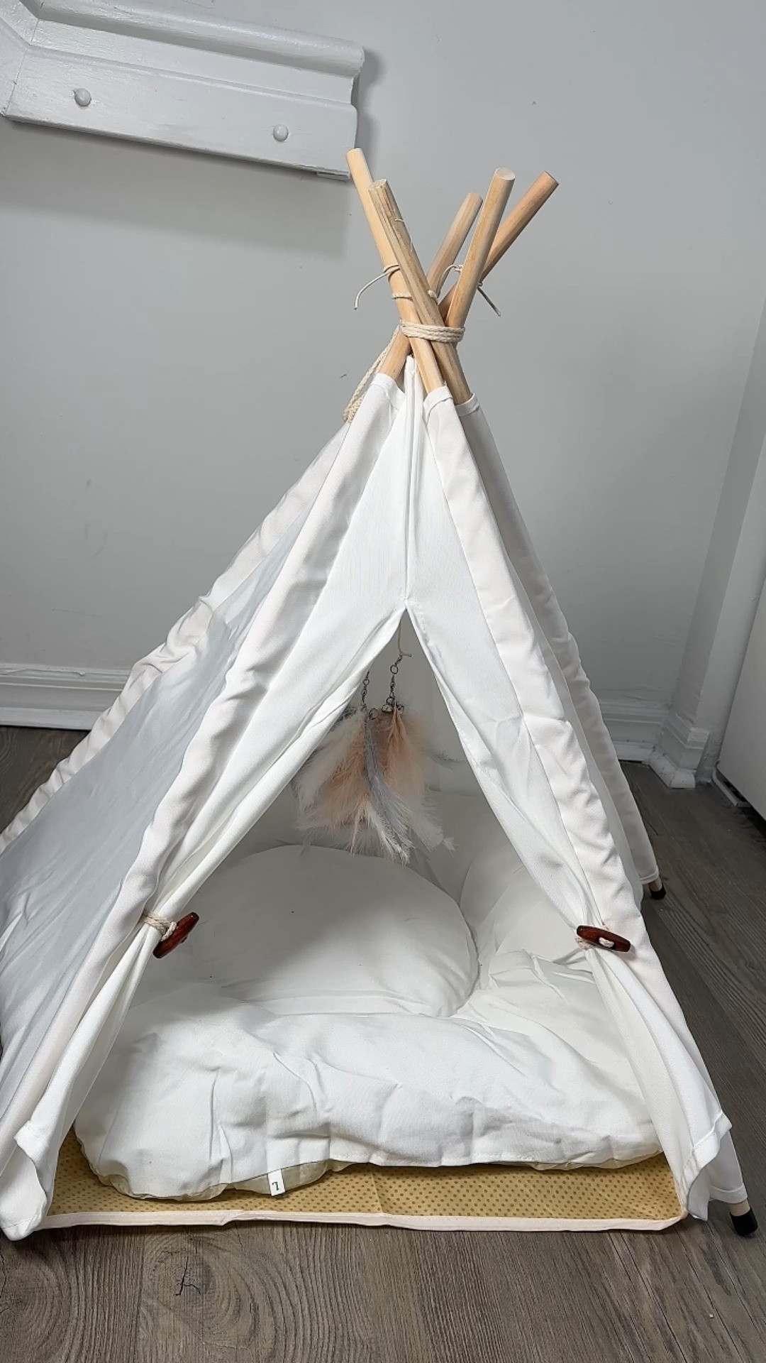 OMG... how adorable is this pet teepee?! 🤎🏕️ My kittens are absolutely obsessed with it! It was super easy to put together, comes with two feather toys for extra fun, and the soft cushion is removable and washable. It's the perfect cozy hideaway for cats, kittens, small dogs, bunnies, and other little pets—and it's the cutest addition to any room! #LTKPets #LTKFinds #LTKFamily #LTKLifestyle 

 #LTKootd #LTKHome #LTKSaleAlert