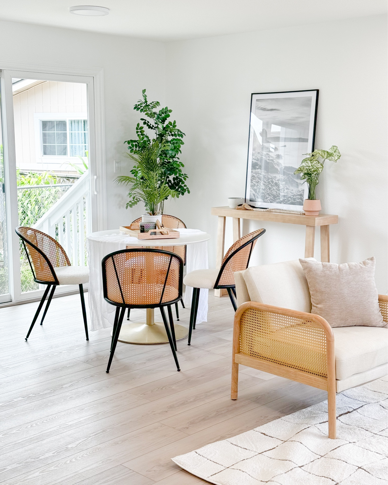 Our Kaneohe new build project includes an open living and dining room flow. We added black accents with light wood tones

#LTKHome