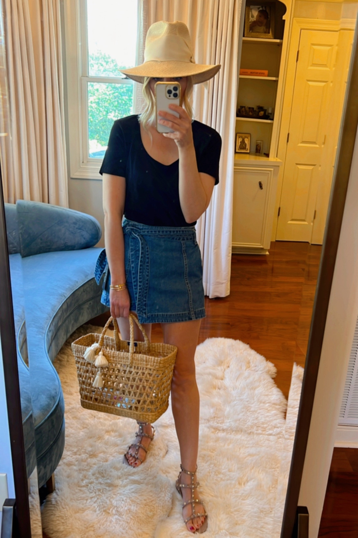 Spring ootd. Denim skirt, denim skort, black tee, Freya hat, fedora, straw bag, sandals, nude sandals, straw hat, spring outfit, vacation outfit, summer outfit 

#LTKshoecrush #LTKitbag

#LTKSeasonal