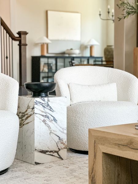 A close up into my living room showing you dupes for my chairs that are very well priced. My marble plinth as amazing!! And of course my coffee table that’s a crowd favorite 

#LTKstyletip #LTKFind #LTKhome