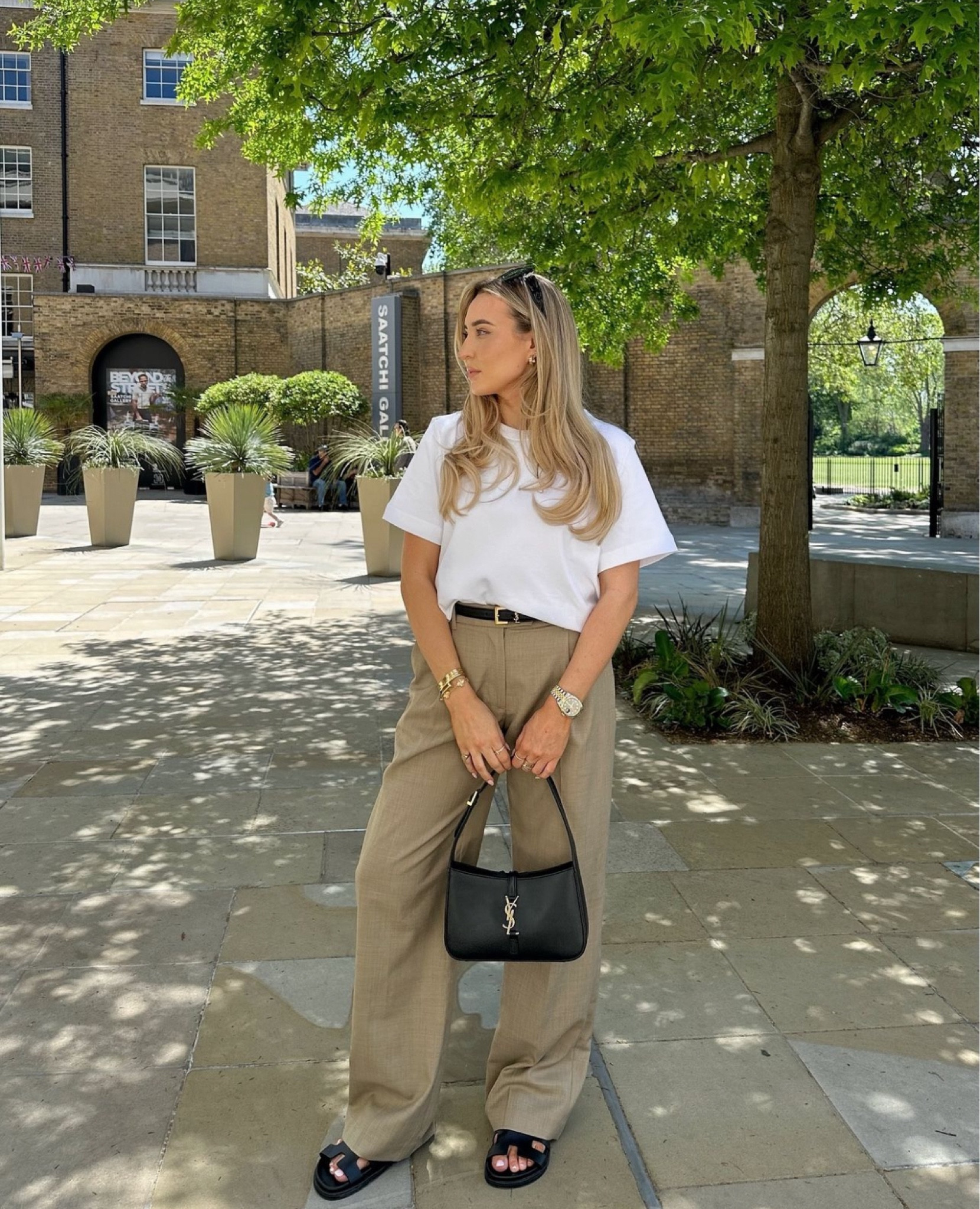 City Look 10 - another neutral beige outfit with my favourite Cos white t-shirt. Workwear appropriate with tailored trousers, styled with black YSL accessories 

#LTKsummer #LTKworkwear #LTKautumn