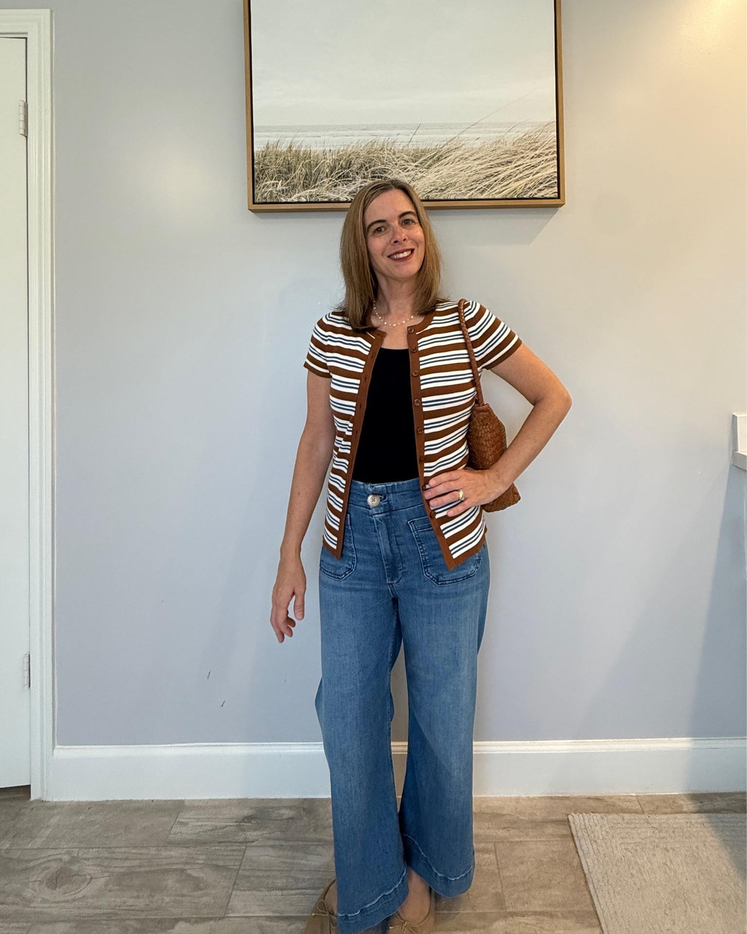 Transitioning into fall with a striped short sleeve button up cardigan, wide leg jeans, and a brown woven purse - autumn style with comfort. 🤎 Fall outfits women over 50

#LTKPetite #LTKOver40 #LTKootd