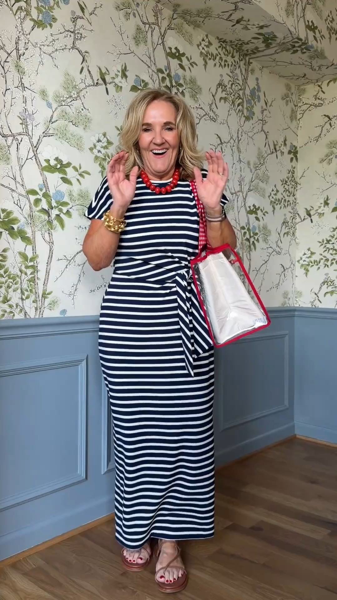 Lightweight, travel-friendly, and incredibly comfortable. I love how easy it is to dress up or down, and the pop of red accessories gives it a fun coastal vibe. 🫶🏻 

 #LTKootd #LTKSeasonal #LTKOver40